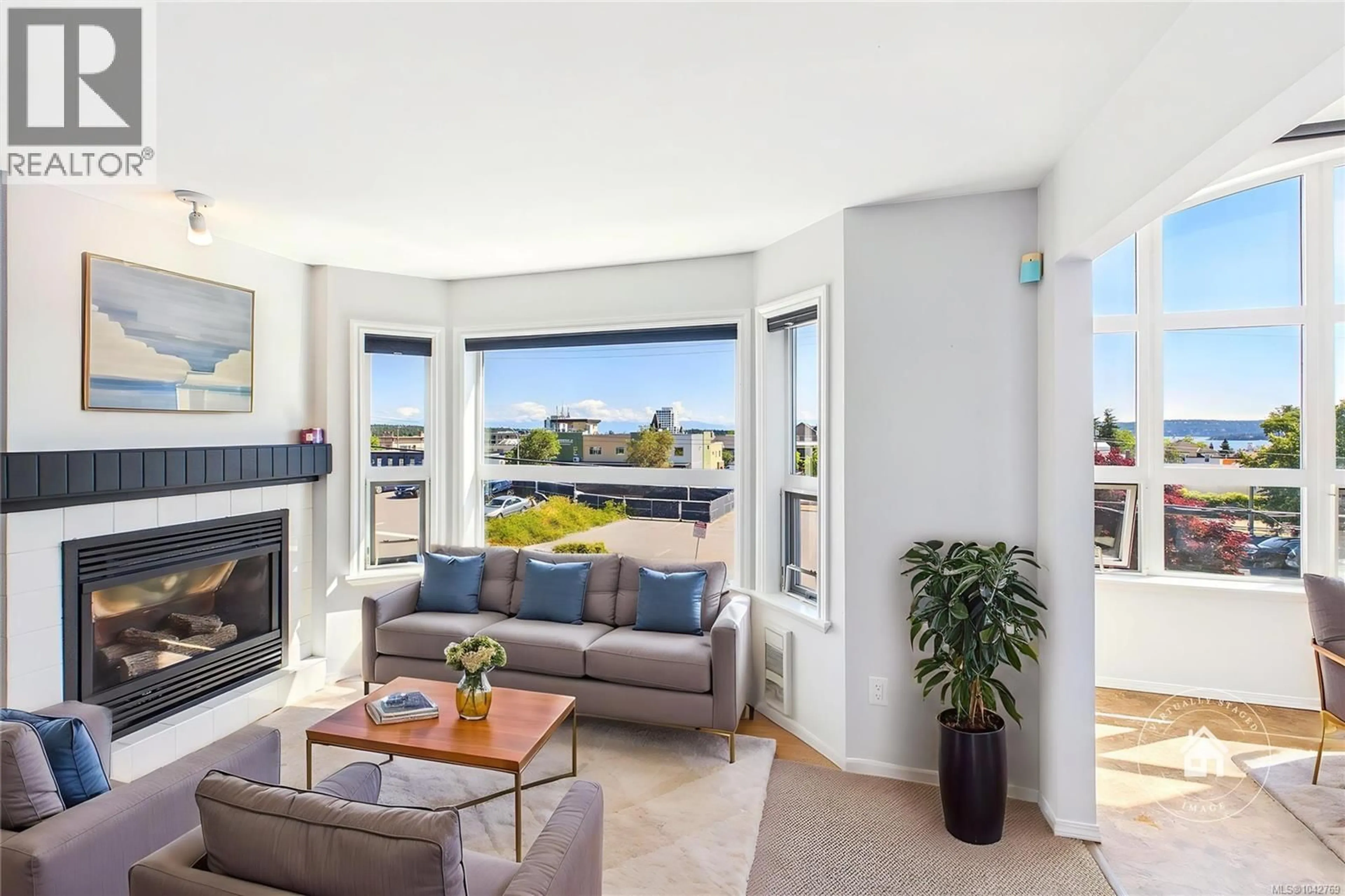 Living room with furniture, unknown for 304 - 327 PRIDEAUX STREET, Nanaimo British Columbia V9R2N4