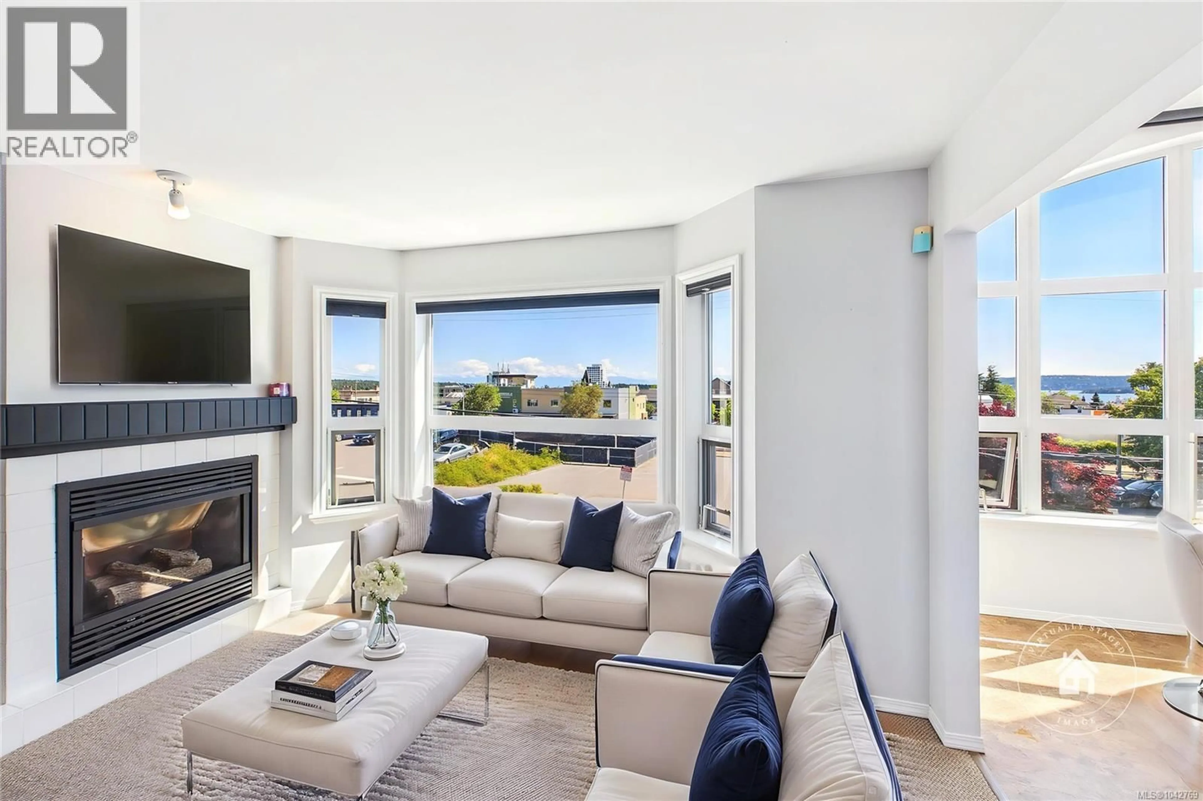 Living room with furniture, unknown for 304 - 327 PRIDEAUX STREET, Nanaimo British Columbia V9R2N4