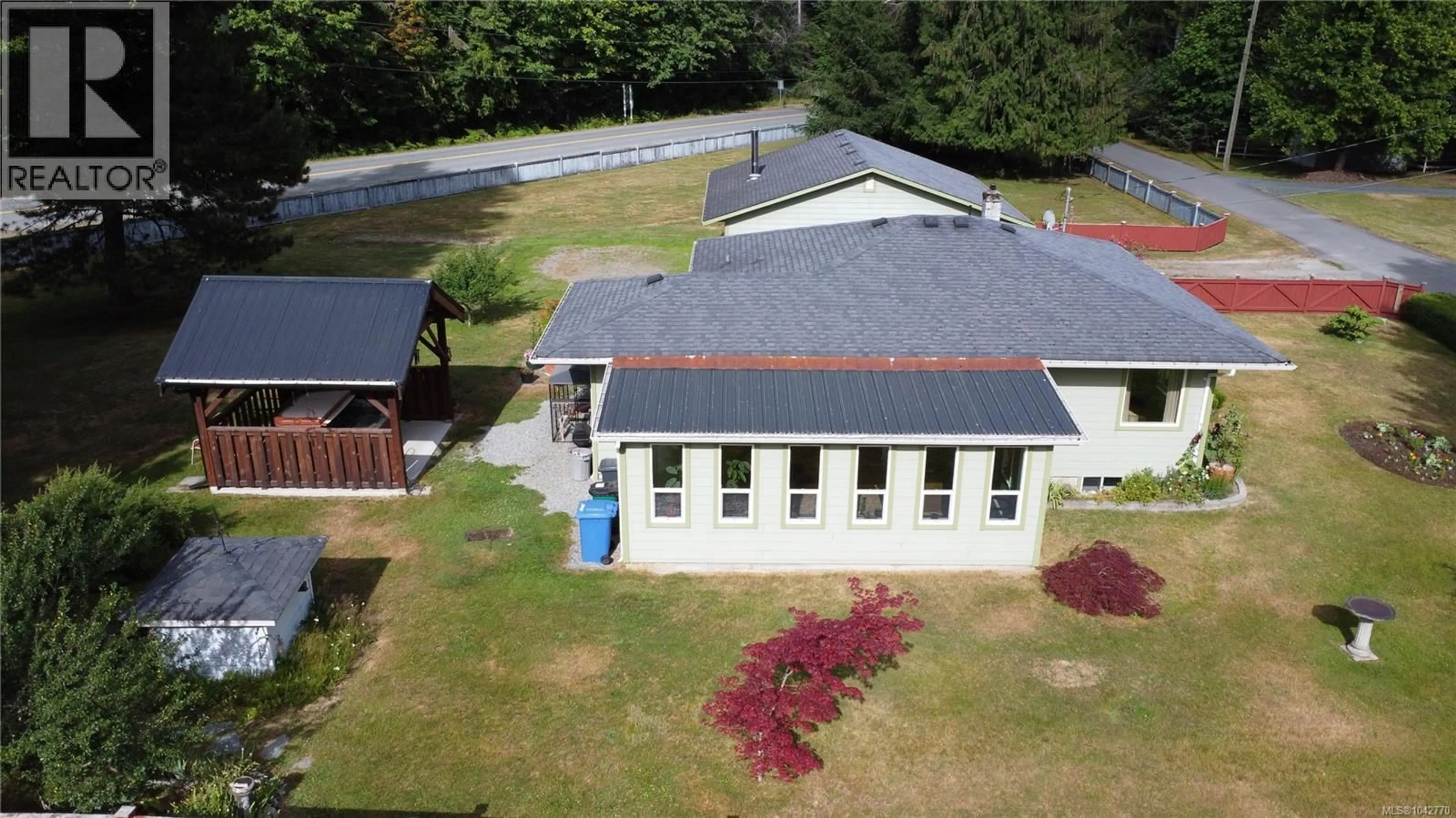 A pic from outside/outdoor area/front of a property/back of a property/a pic from drone, building for 10289 TAMEA ROAD, Honeymoon Bay British Columbia V0R1Y0