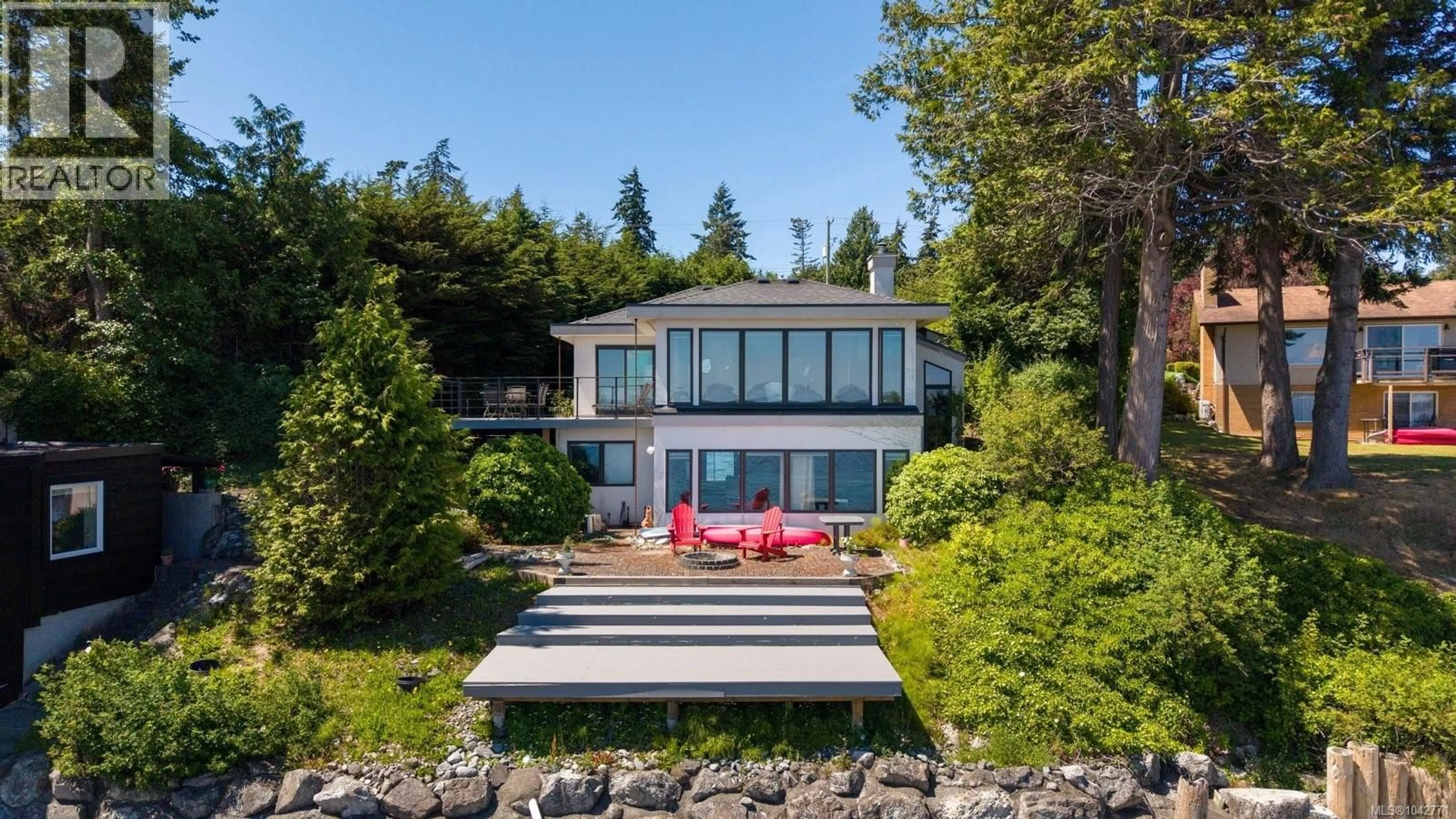 A pic from outside/outdoor area/front of a property/back of a property/a pic from drone, water/lake/river/ocean view for 8543 LOCHSIDE DRIVE, North Saanich British Columbia V8L1M5