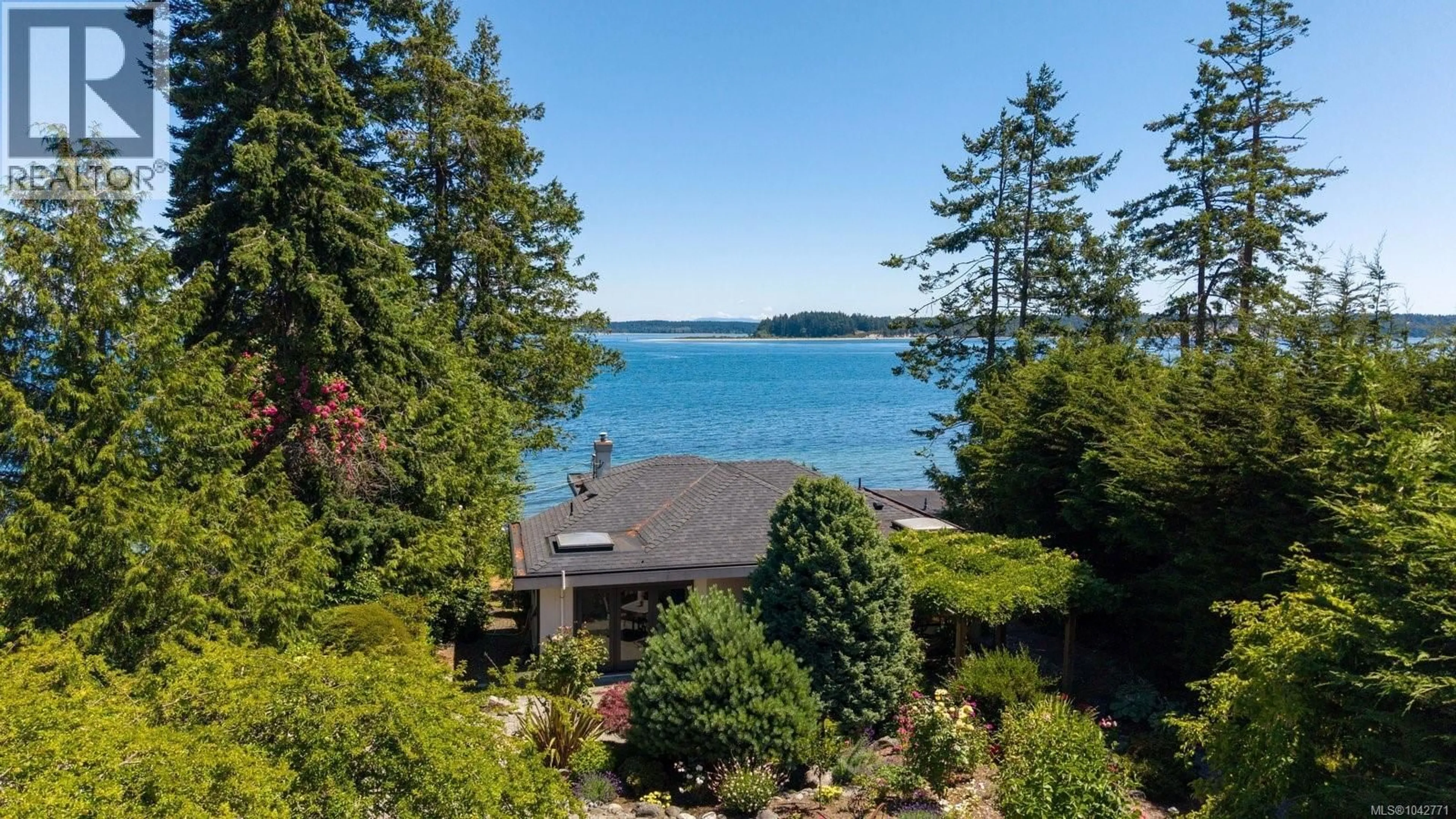 A pic from outside/outdoor area/front of a property/back of a property/a pic from drone, water/lake/river/ocean view for 8543 LOCHSIDE DRIVE, North Saanich British Columbia V8L1M5