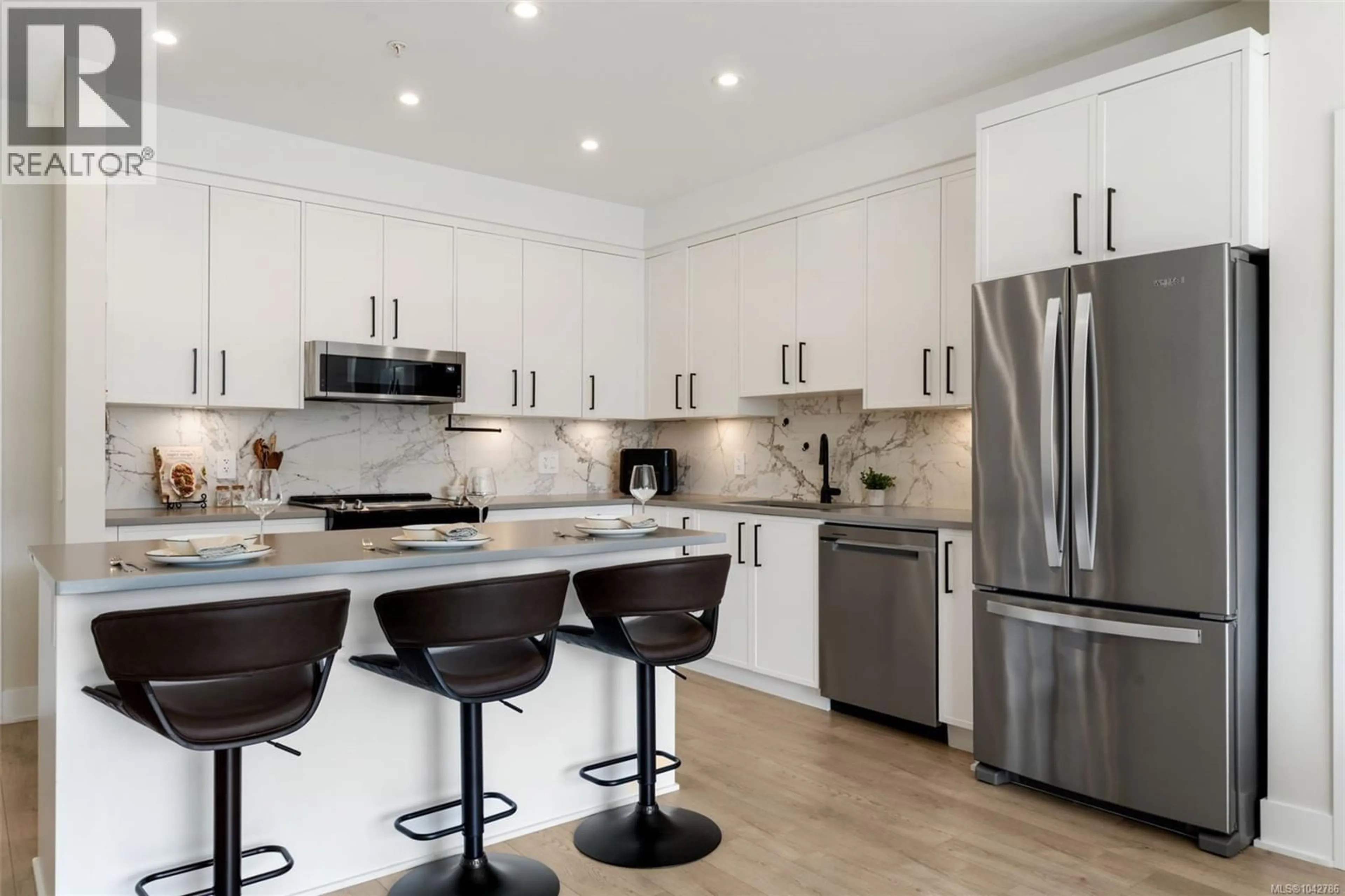 Contemporary kitchen, unknown for 306 - 1371 GOLDSTREAM AVENUE, Langford British Columbia V9B7B4