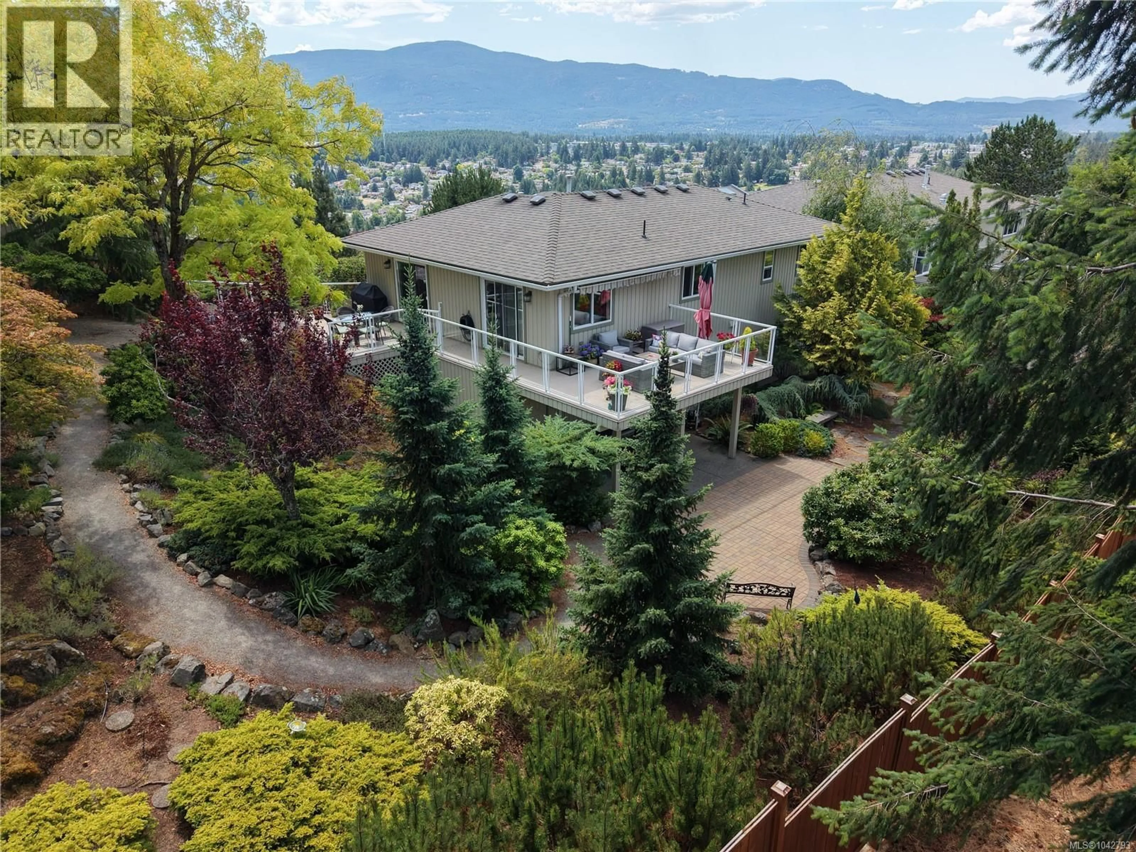 A pic from outside/outdoor area/front of a property/back of a property/a pic from drone, mountain view for 3255 FOLKESTONE DRIVE, Nanaimo British Columbia V9T5V2