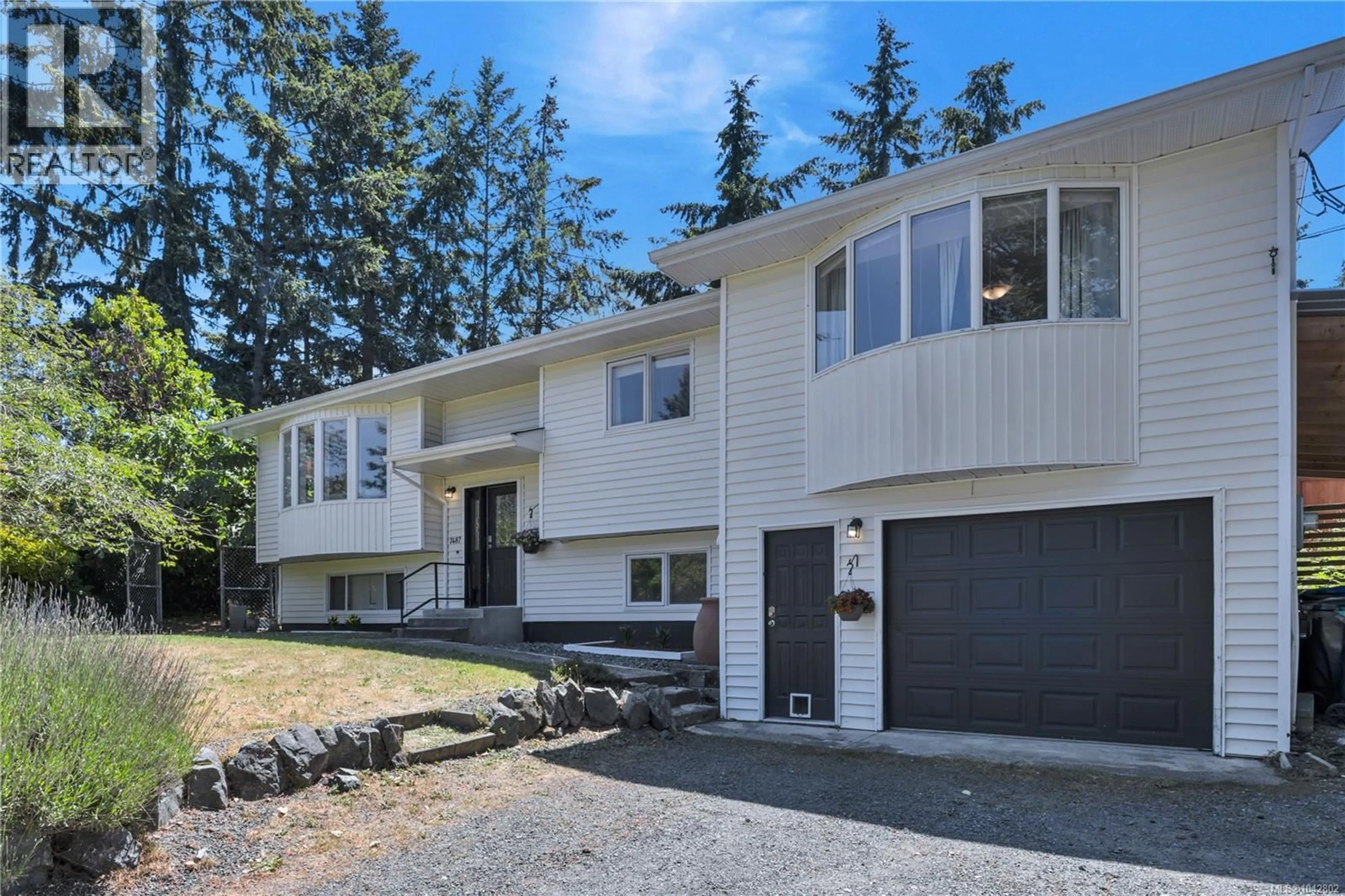 Home with vinyl exterior material, street for 7487 FOREST TURN WAY, Lantzville British Columbia V0R2H0