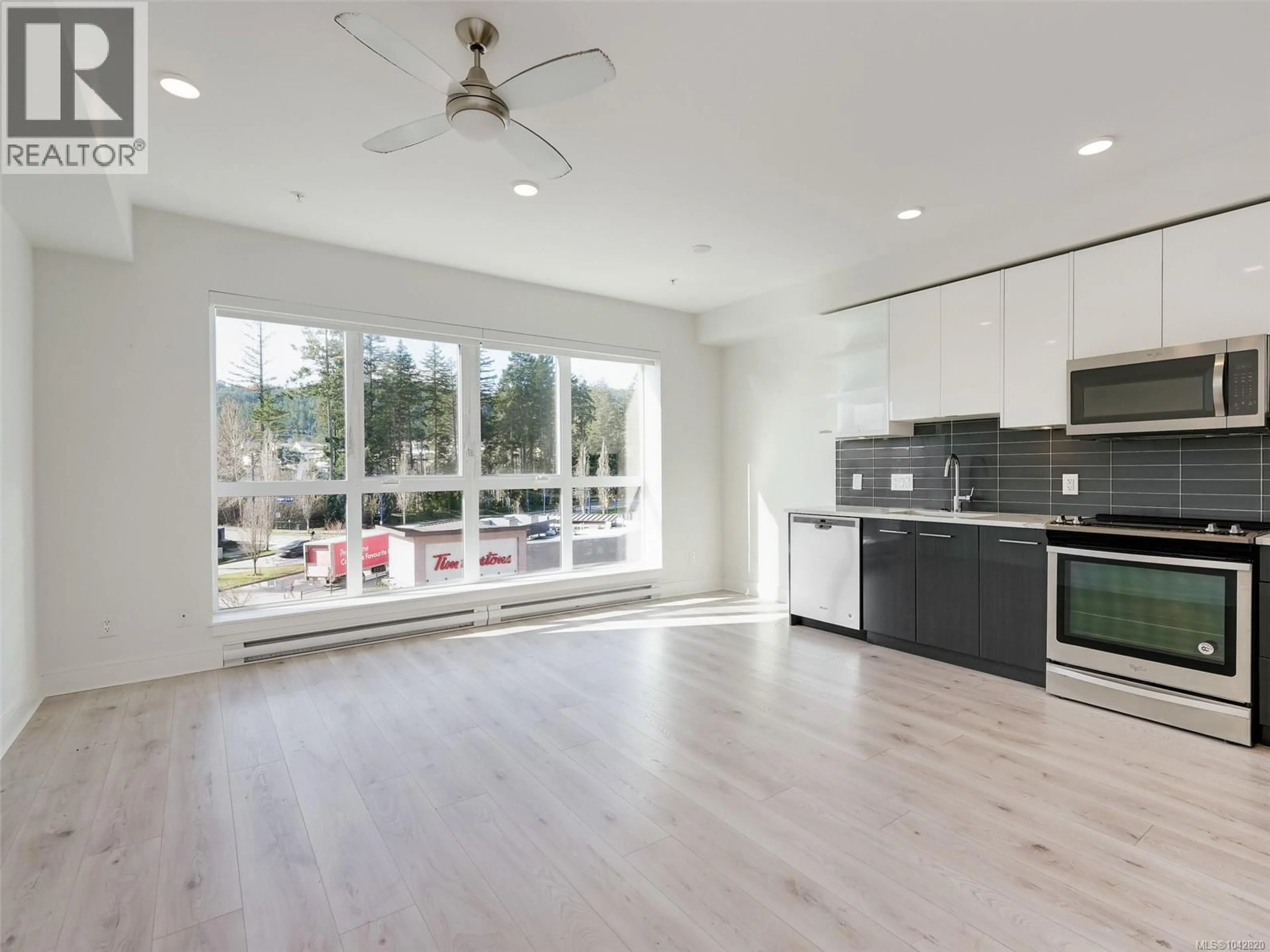 Open concept kitchen, unknown for 407 - 1311 LAKEPOINT WAY, Langford British Columbia V9B0S7