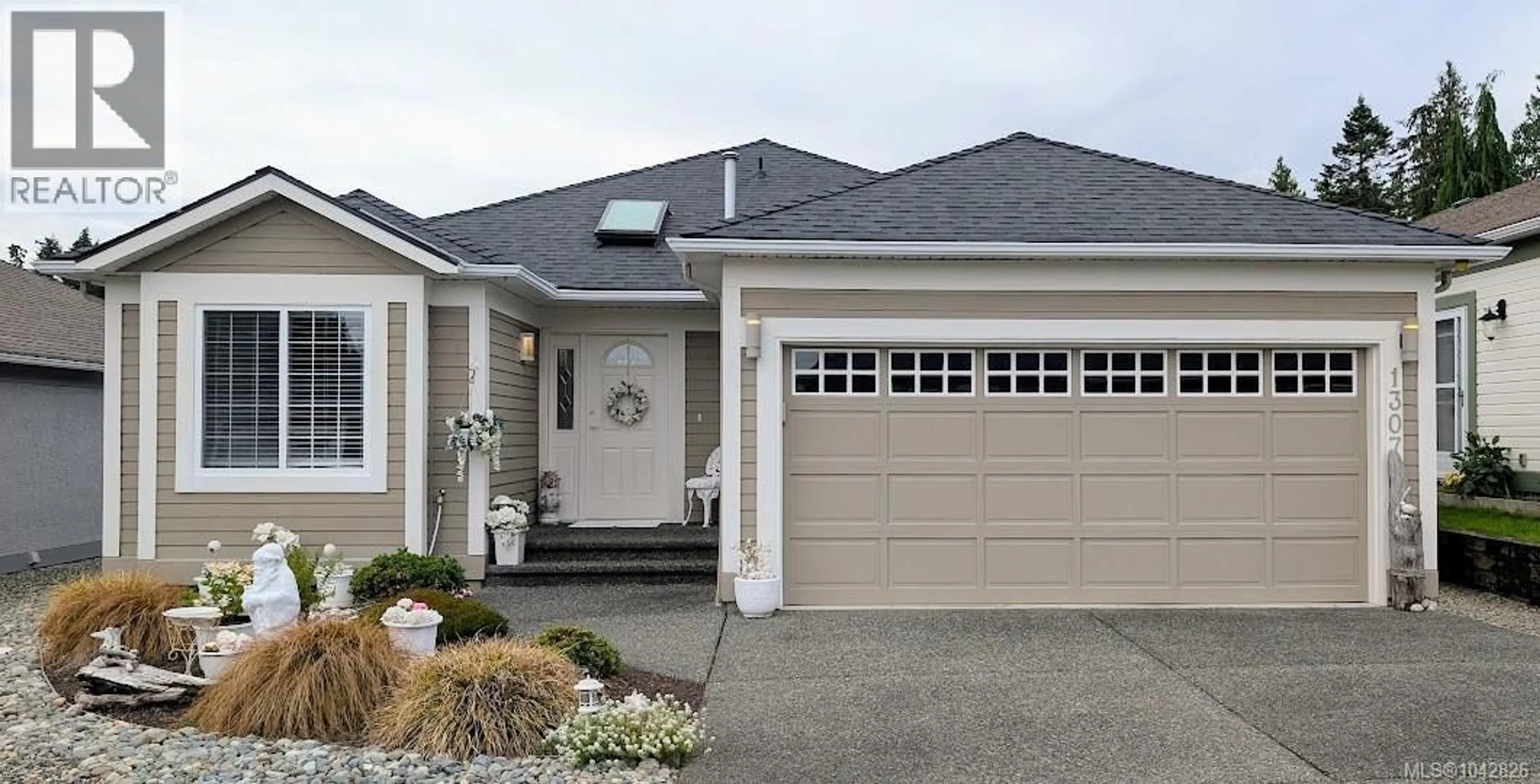 Home with vinyl exterior material, street for 1307 OCEANSIDE DRIVE, Qualicum Beach British Columbia V9K2K4