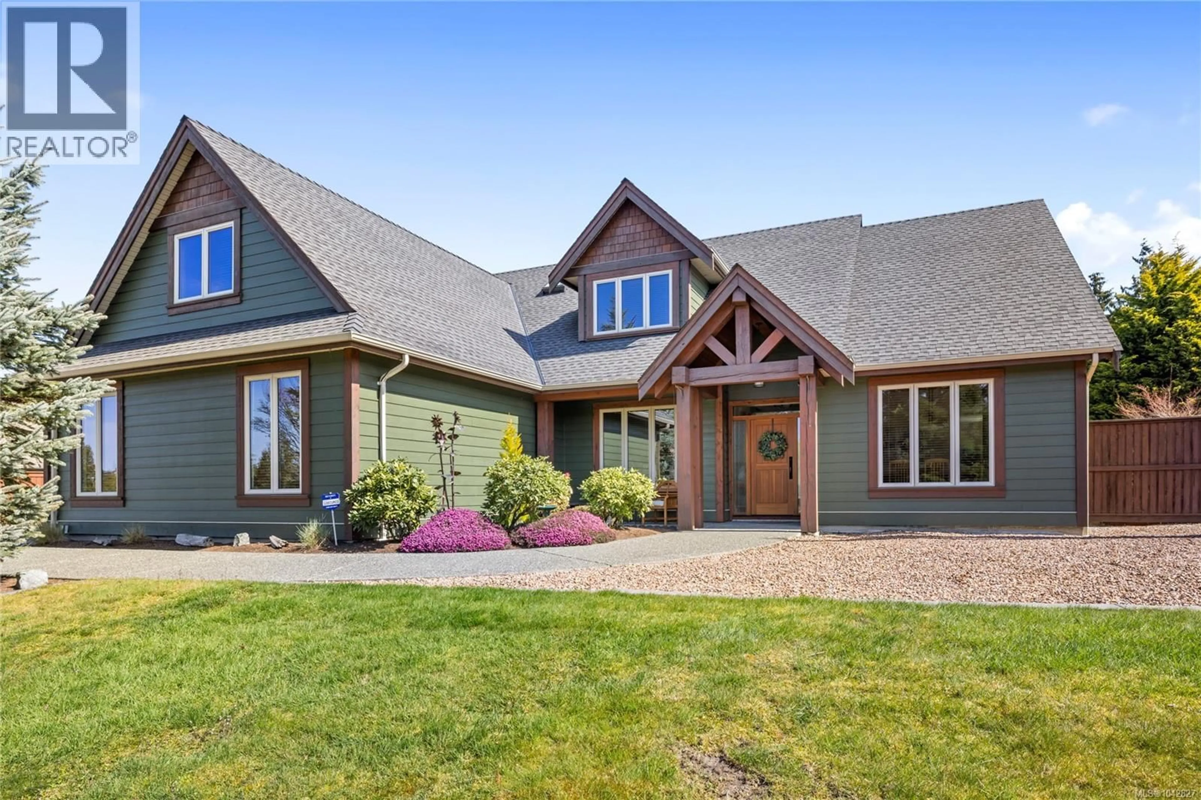 Home with vinyl exterior material, street for 1520 STONE LAKE DRIVE, Nanoose Bay British Columbia V9P9M6