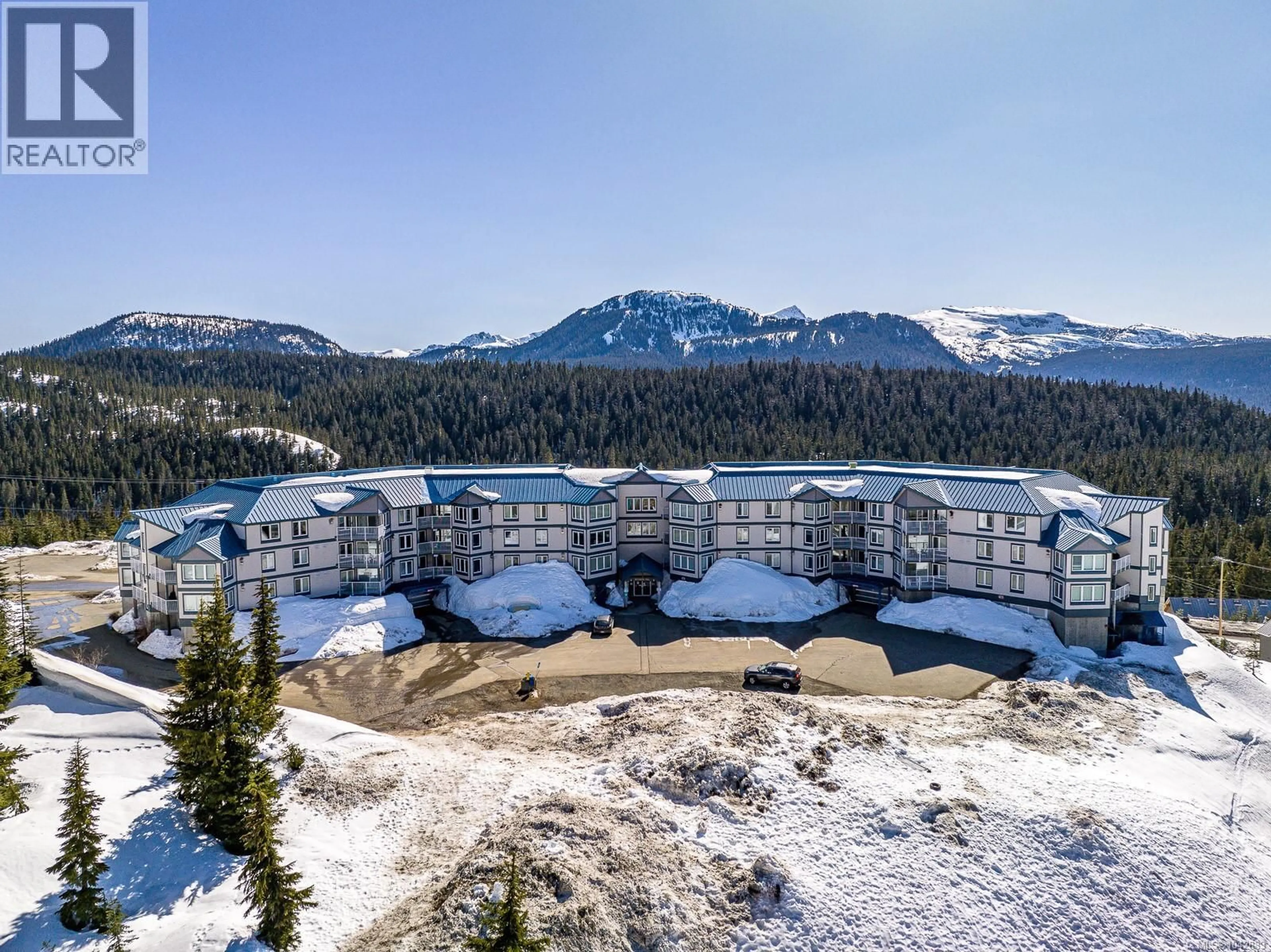 A pic from outside/outdoor area/front of a property/back of a property/a pic from drone, mountain view for 215 - 1320 HENRY ROAD, Courtenay British Columbia V9J1L0