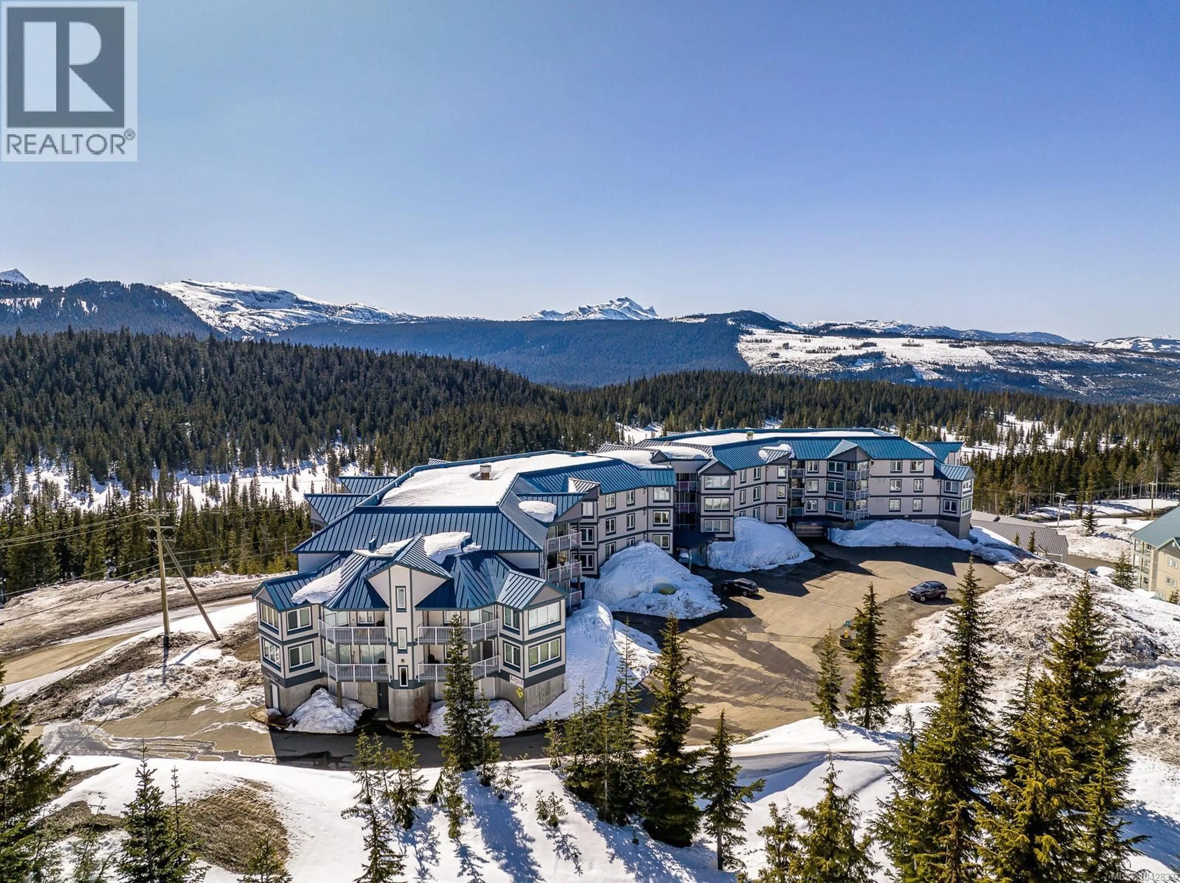 A pic from outside/outdoor area/front of a property/back of a property/a pic from drone, mountain view for 215 - 1320 HENRY ROAD, Courtenay British Columbia V9J1L0