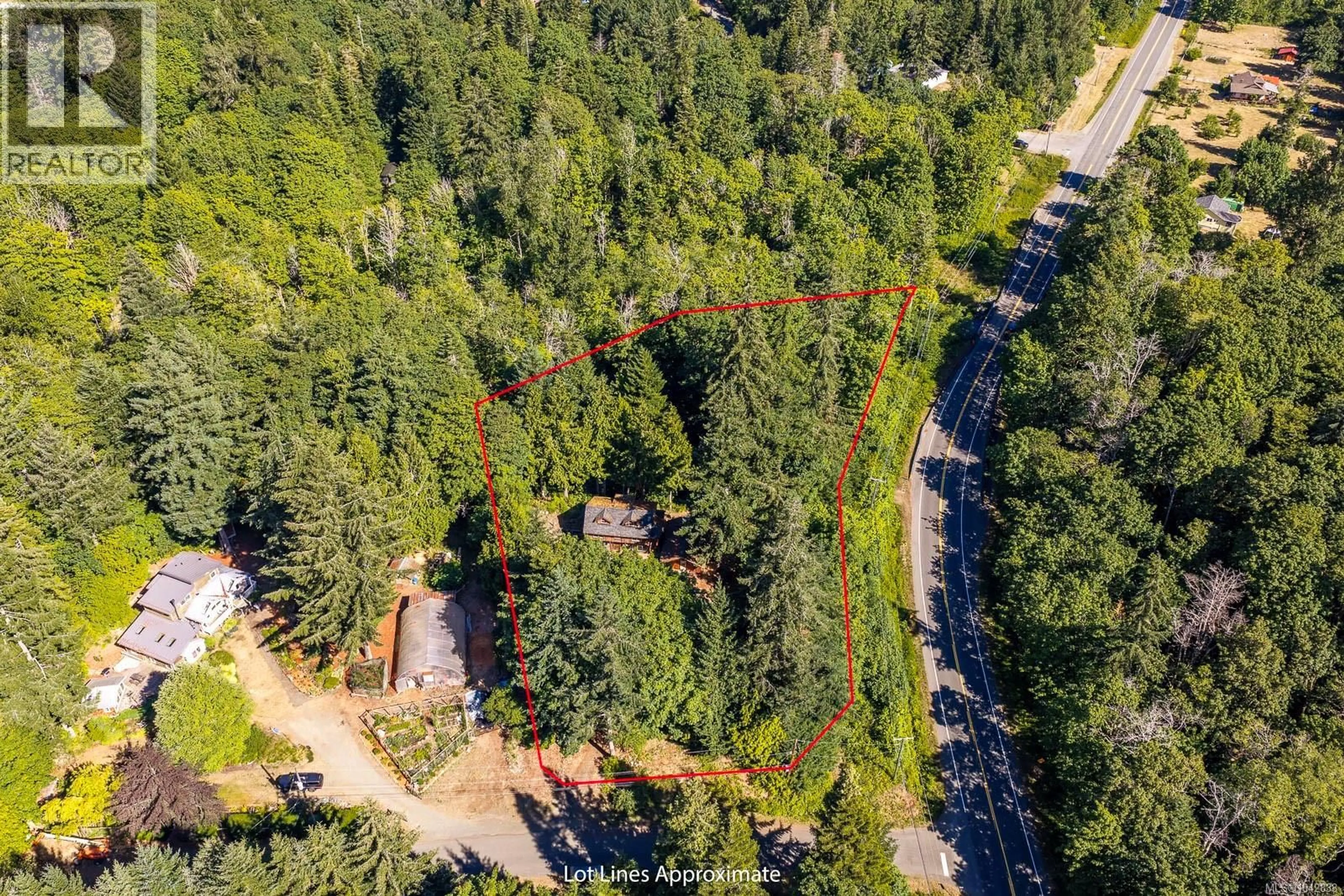 A pic from outside/outdoor area/front of a property/back of a property/a pic from drone, forest/trees view for 448 LEET LANE, Fanny Bay British Columbia V0R1W0