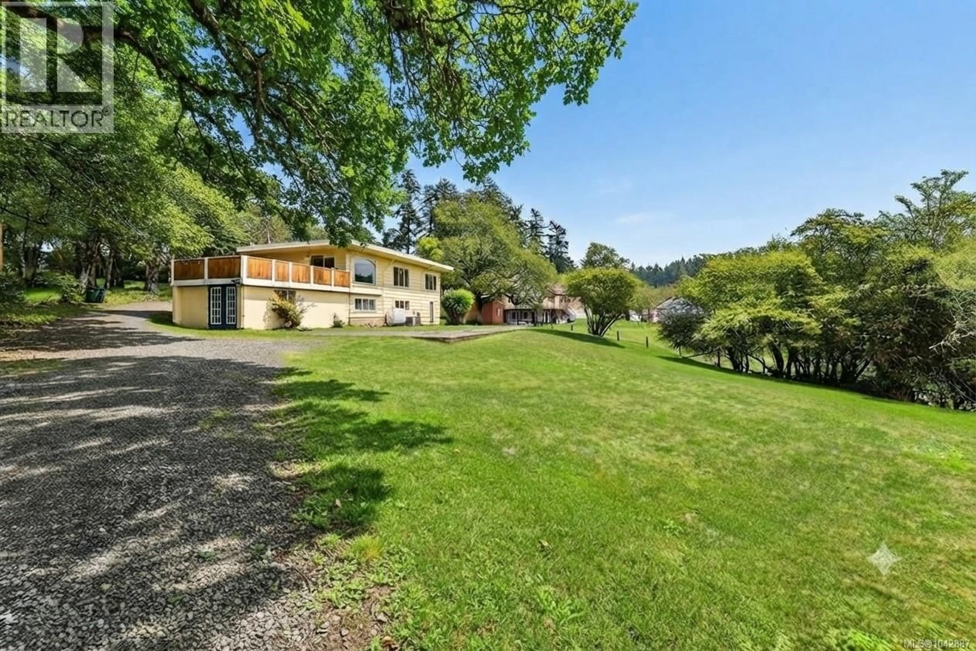 A pic from outside/outdoor area/front of a property/back of a property/a pic from drone, water/lake/river/ocean view for 4589 SCARBOROUGH ROAD, Saanich British Columbia V8Z5N6