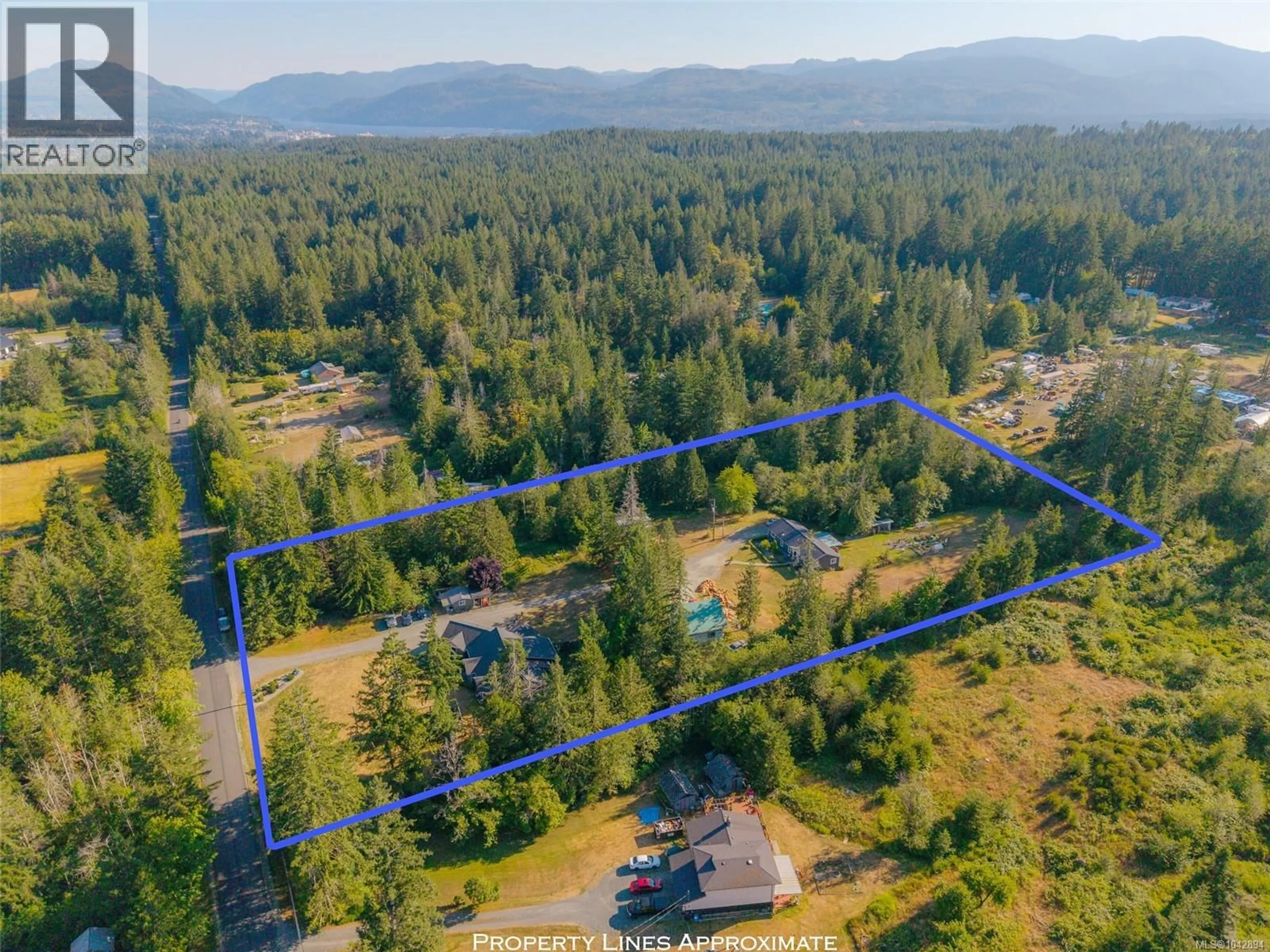A pic from outside/outdoor area/front of a property/back of a property/a pic from drone, forest/trees view for 6718 CYPRESS BOULEVARD, Port Alberni British Columbia V9Y8T7
