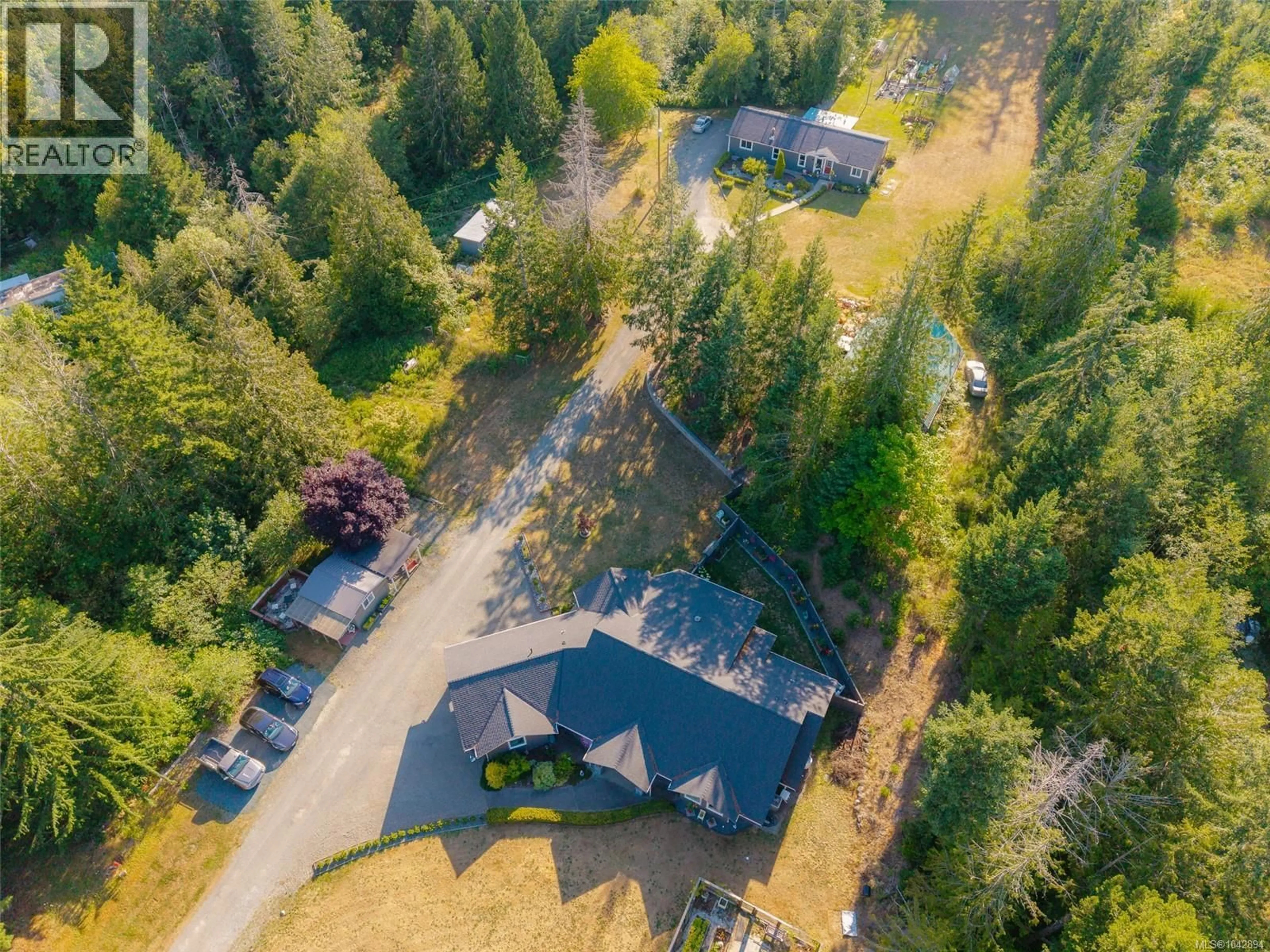 A pic from outside/outdoor area/front of a property/back of a property/a pic from drone, forest/trees view for 6718 CYPRESS BOULEVARD, Port Alberni British Columbia V9Y8T7