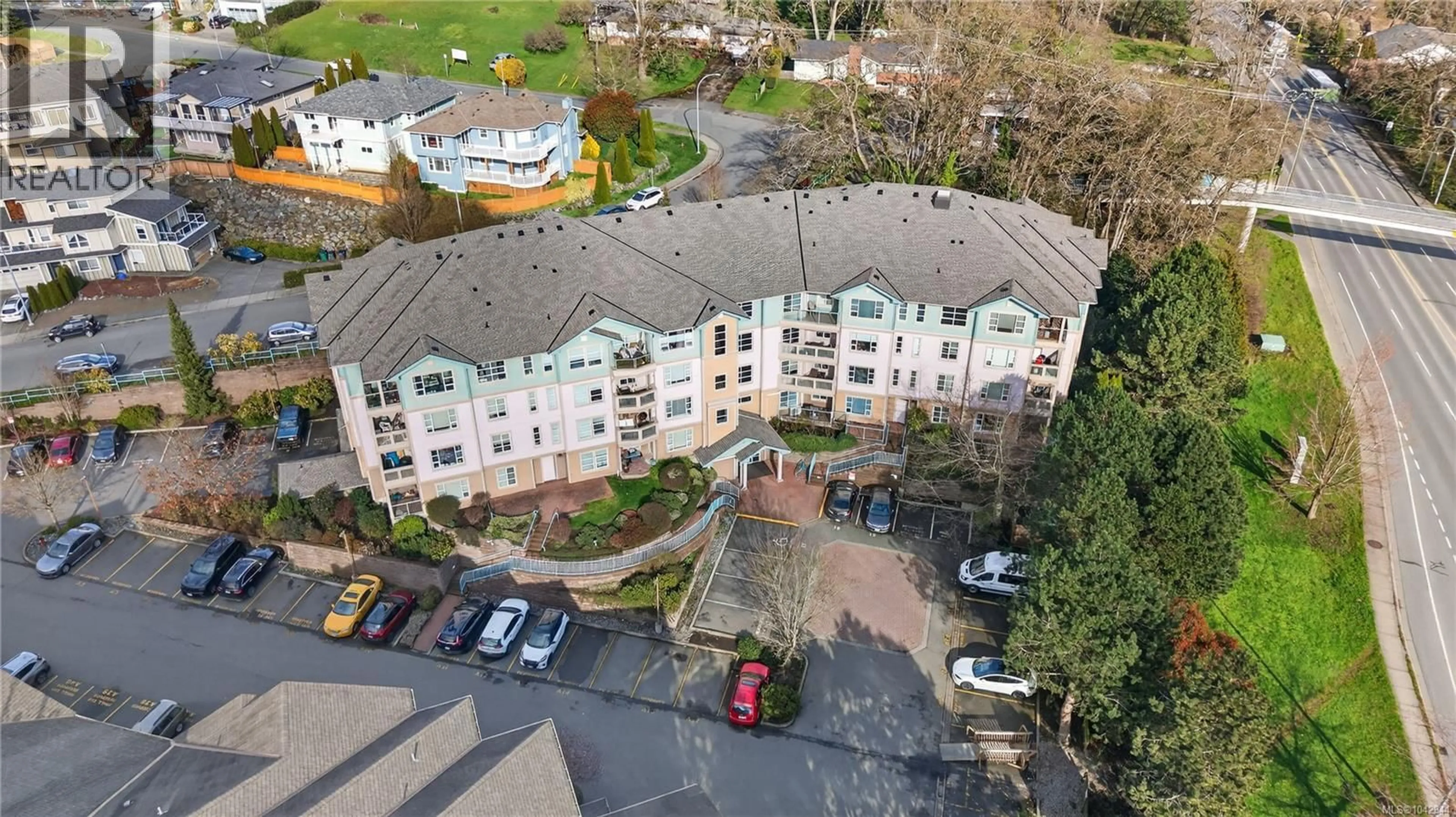 A pic from outside/outdoor area/front of a property/back of a property/a pic from drone, unknown for 204 - 799 BLACKBERRY ROAD, Saanich British Columbia V8X5J3