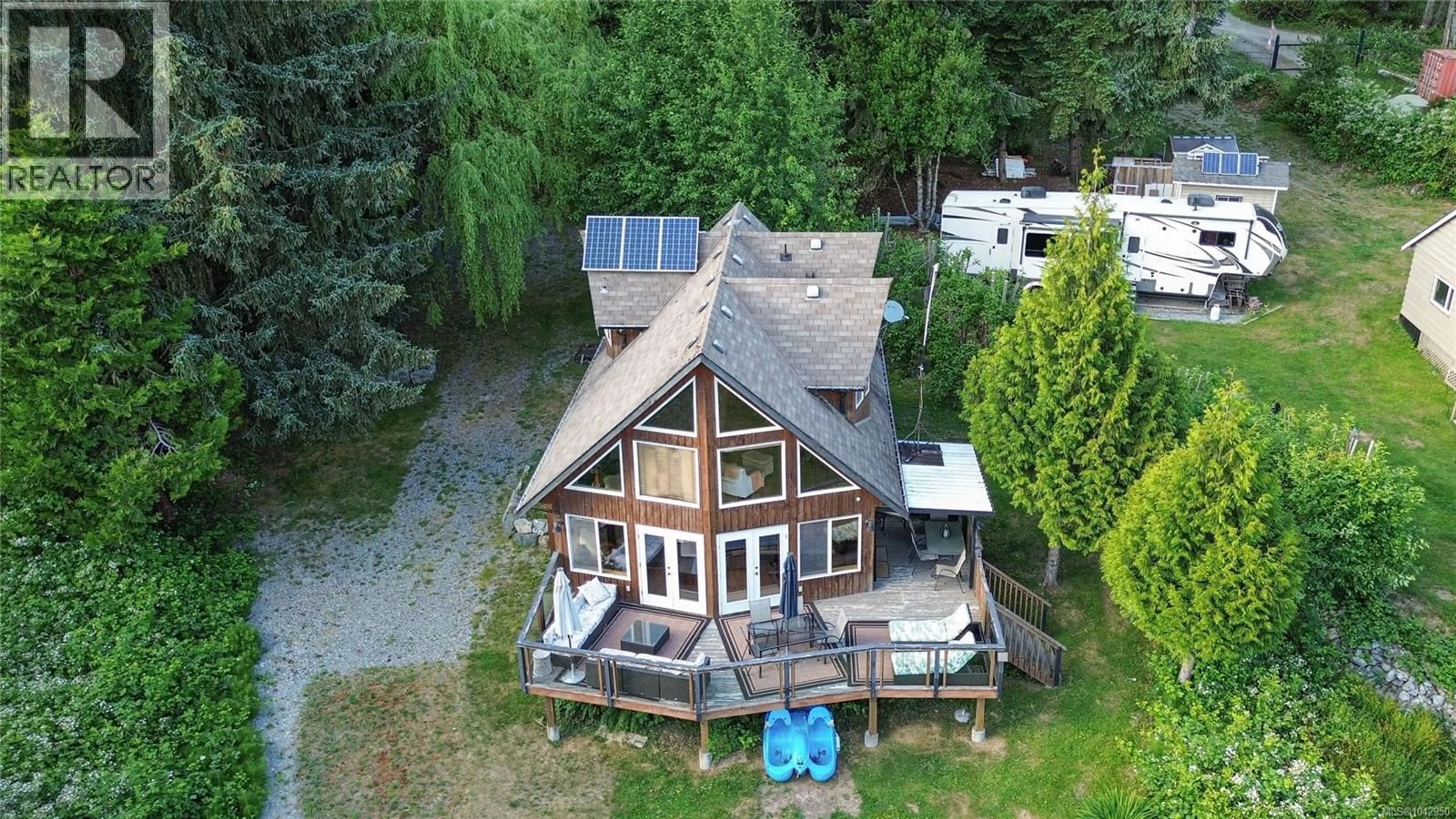 A pic from outside/outdoor area/front of a property/back of a property/a pic from drone, water/lake/river/ocean view for 11464 YOUBOU ROAD, Youbou British Columbia V0R3E1