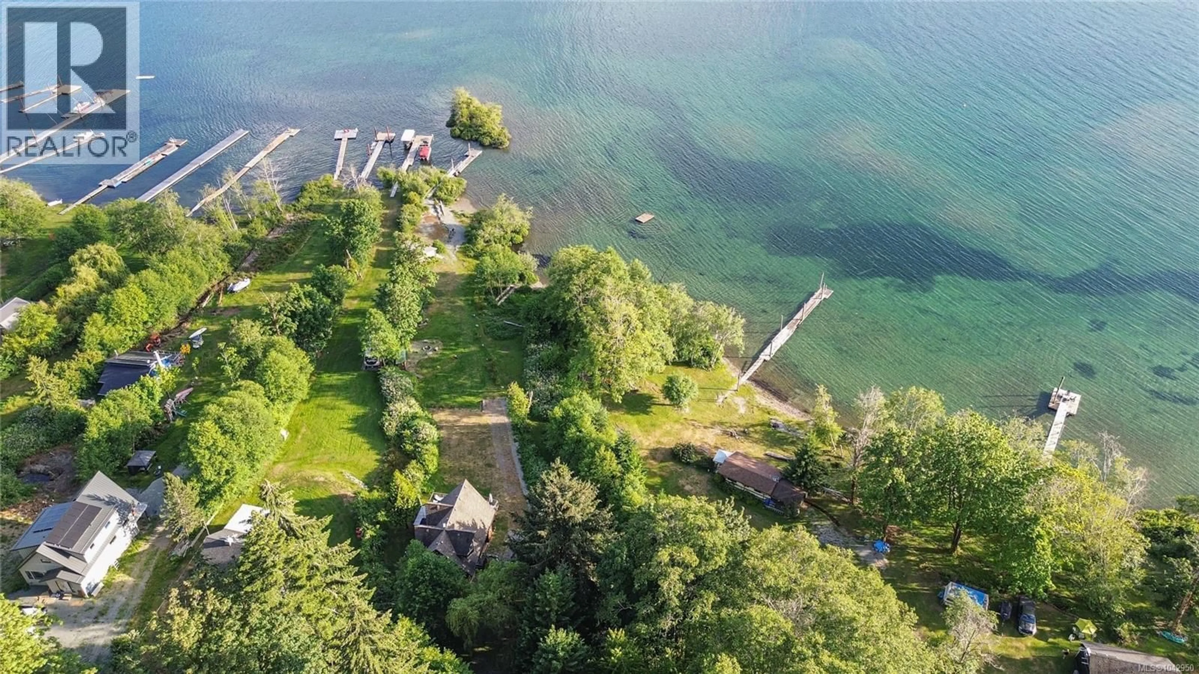 A pic from outside/outdoor area/front of a property/back of a property/a pic from drone, water/lake/river/ocean view for 11464 YOUBOU ROAD, Youbou British Columbia V0R3E1