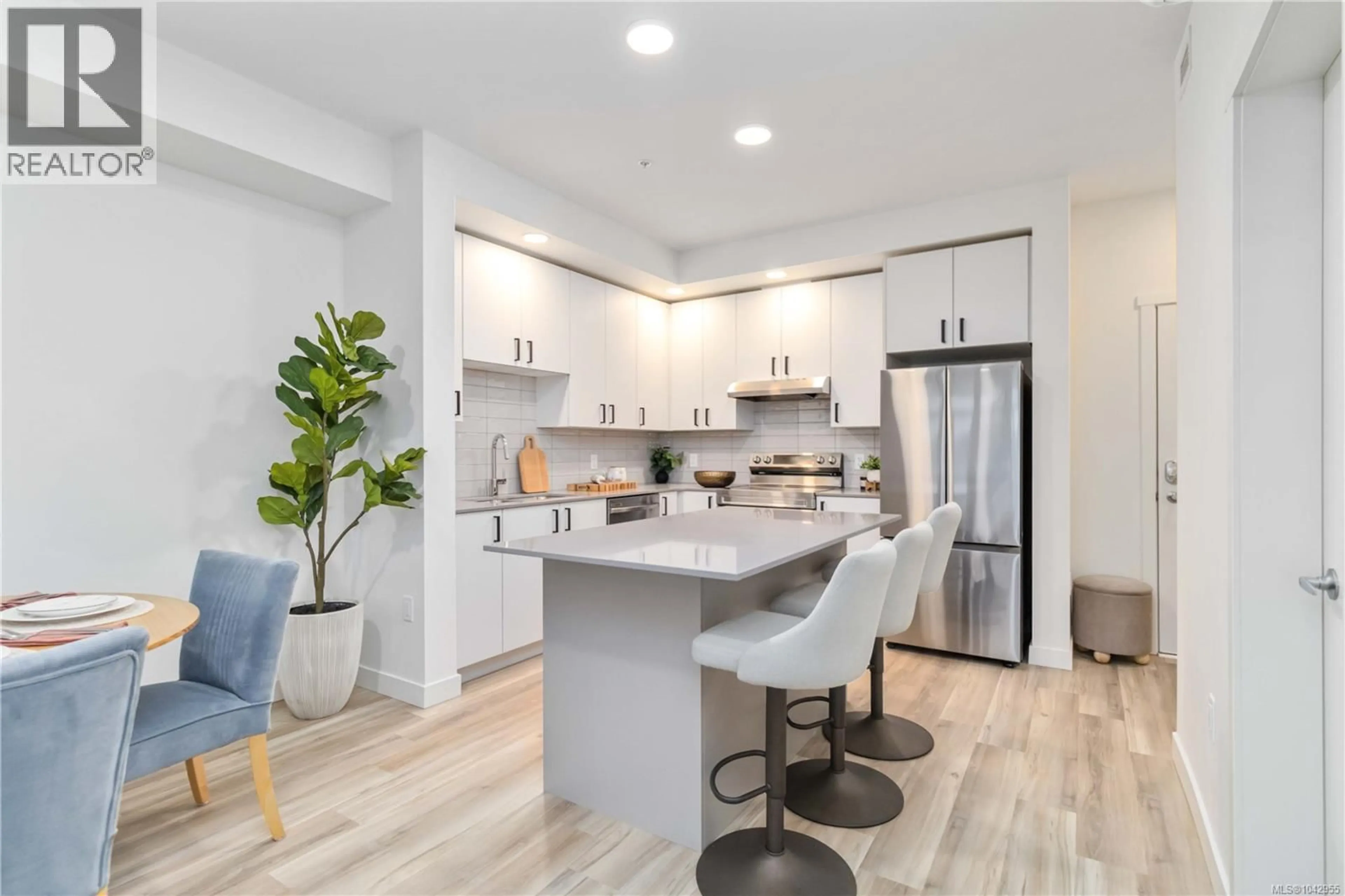 Open concept kitchen, ceramic/tile floor for 513 - 2390 CITY GATE BOULEVARD, Langford British Columbia V9B7E8