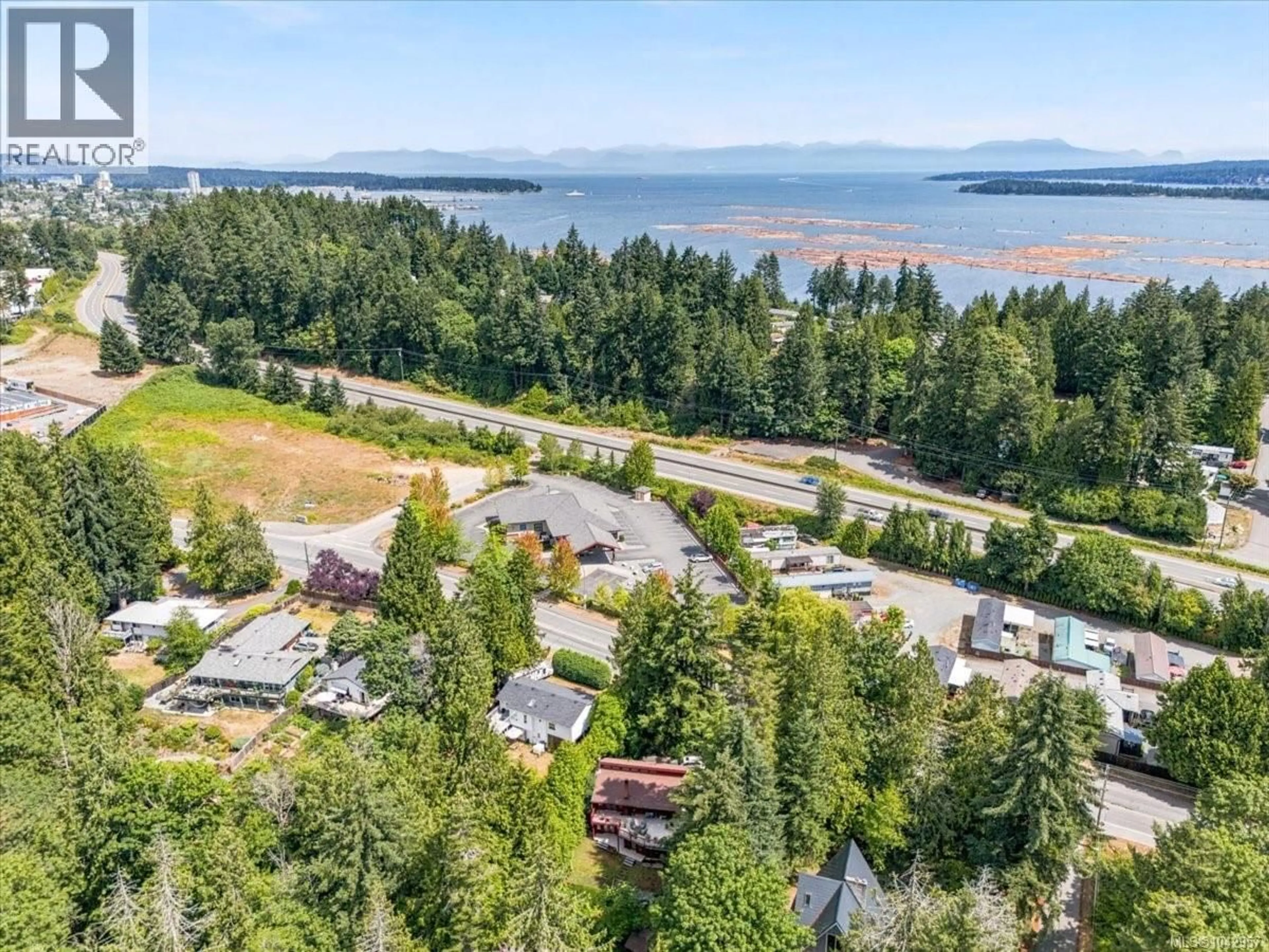 A pic from outside/outdoor area/front of a property/back of a property/a pic from drone, water/lake/river/ocean view for 1071 OLD VICTORIA ROAD, Nanaimo British Columbia V9R6R4