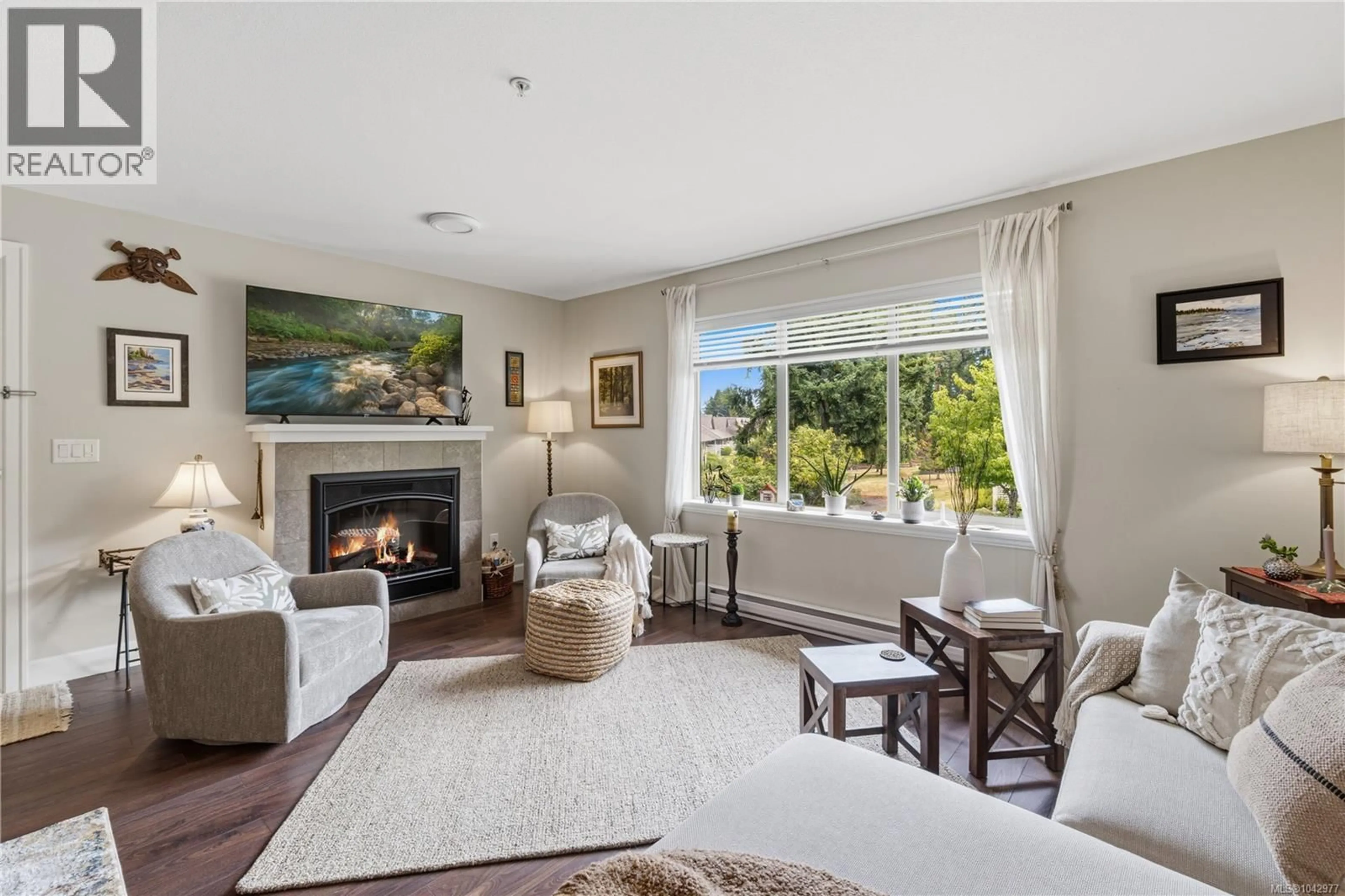 Living room with furniture, unknown for 202 - 4442 HEDGESTONE PLACE, Nanaimo British Columbia V9T0E6