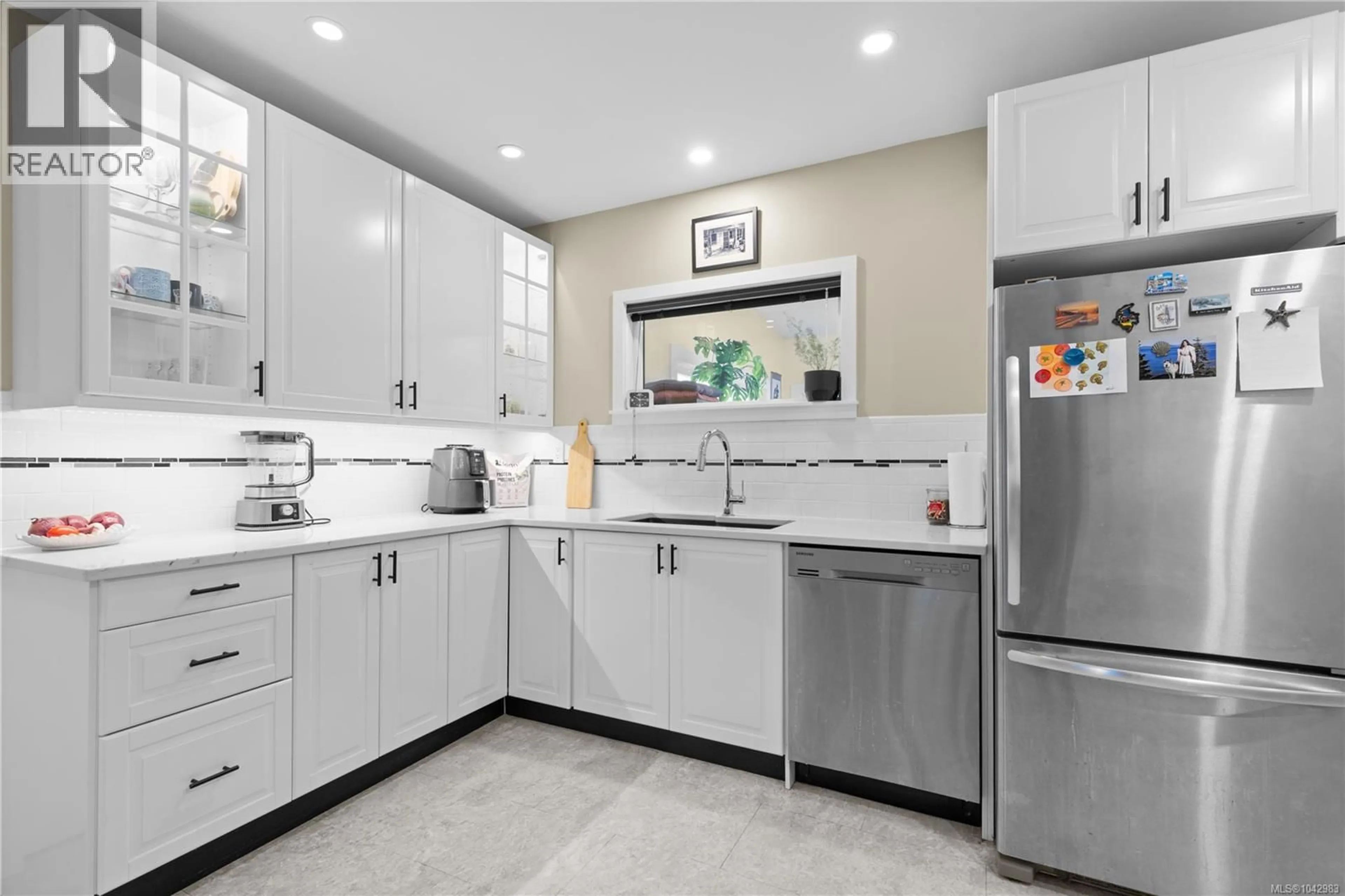 Contemporary kitchen, ceramic/tile floor for 3959 CEDAR HILL CROSS ROAD, Saanich British Columbia V8P2N8