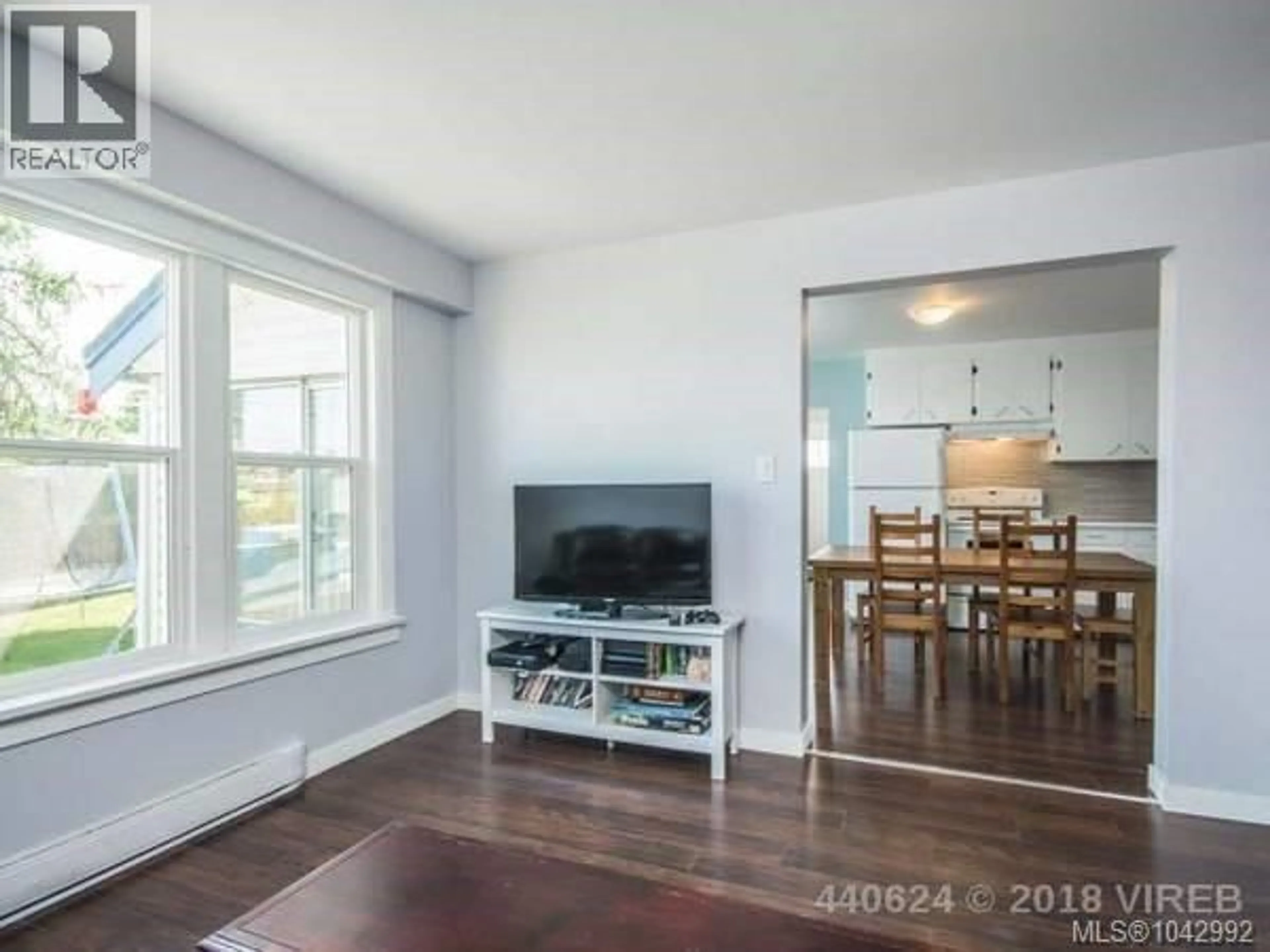 Living room with furniture, wood/laminate floor for 706 HALIBURTON STREET, Nanaimo British Columbia V9R4W7