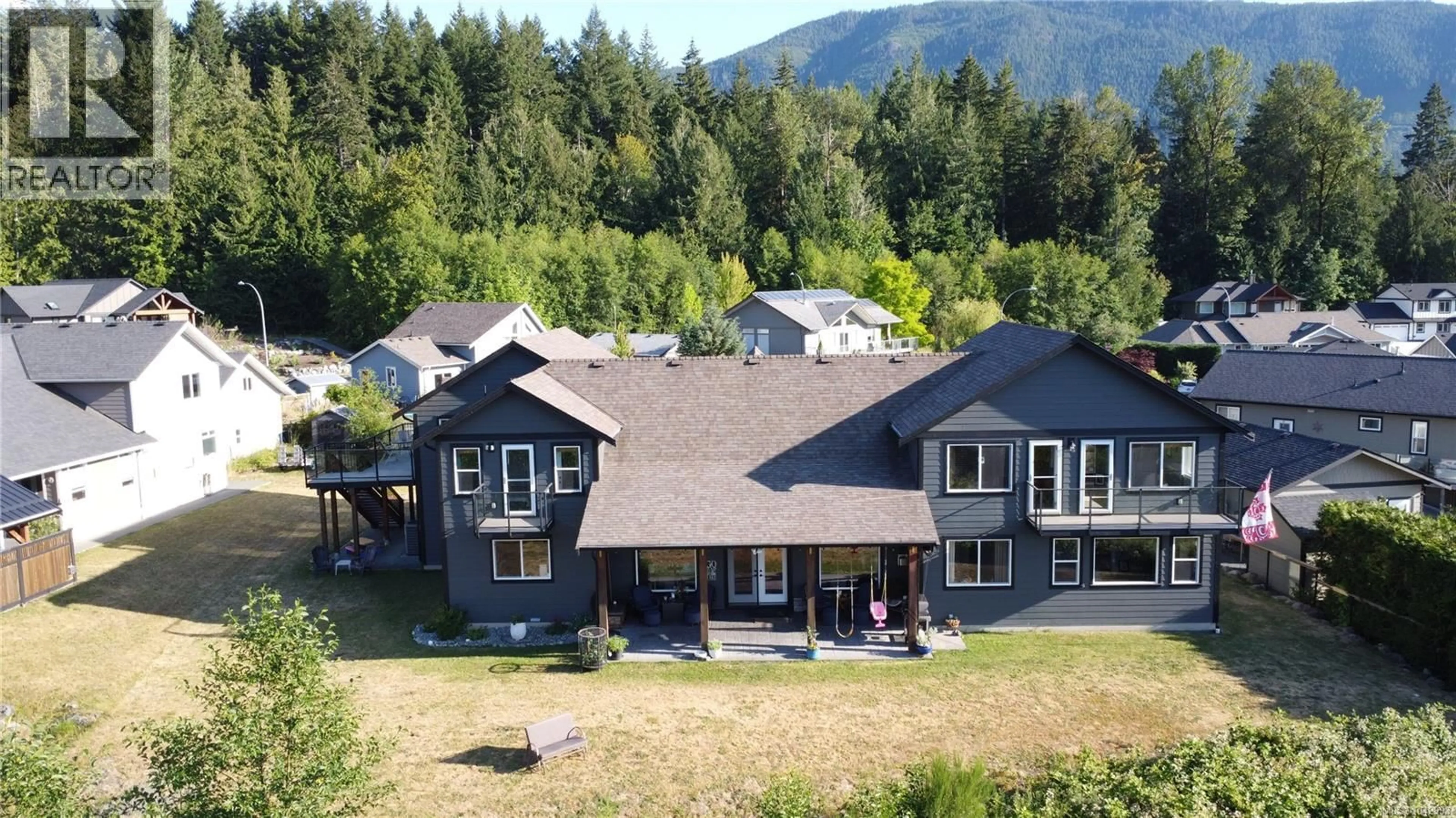 A pic from outside/outdoor area/front of a property/back of a property/a pic from drone, mountain view for 213 TAL CRESCENT, Lake Cowichan British Columbia V0R2G0