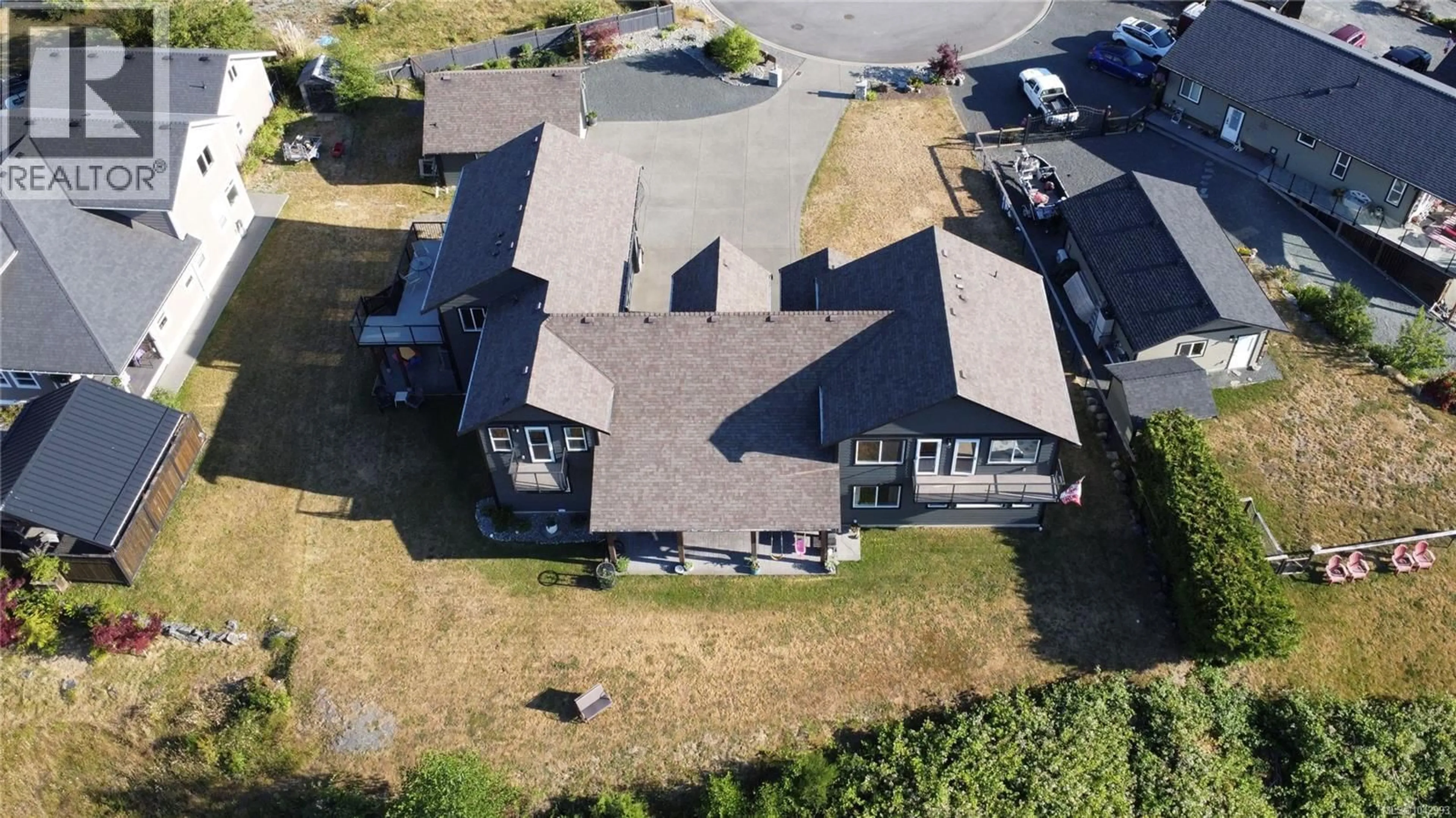 A pic from outside/outdoor area/front of a property/back of a property/a pic from drone, building for 213 TAL CRESCENT, Lake Cowichan British Columbia V0R2G0