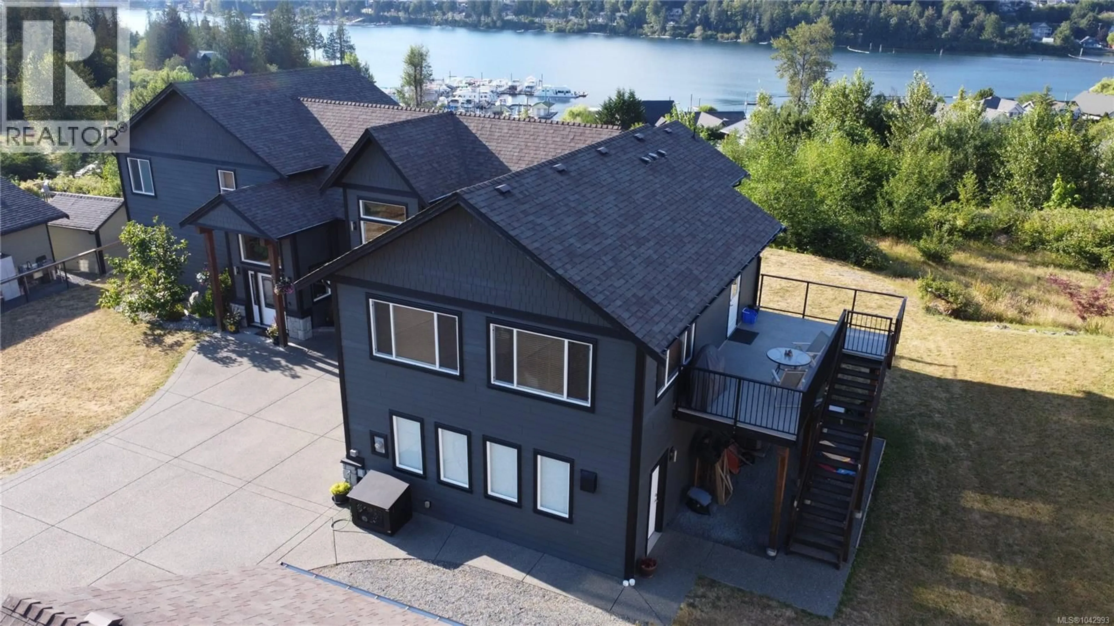A pic from outside/outdoor area/front of a property/back of a property/a pic from drone, water/lake/river/ocean view for 213 TAL CRESCENT, Lake Cowichan British Columbia V0R2G0
