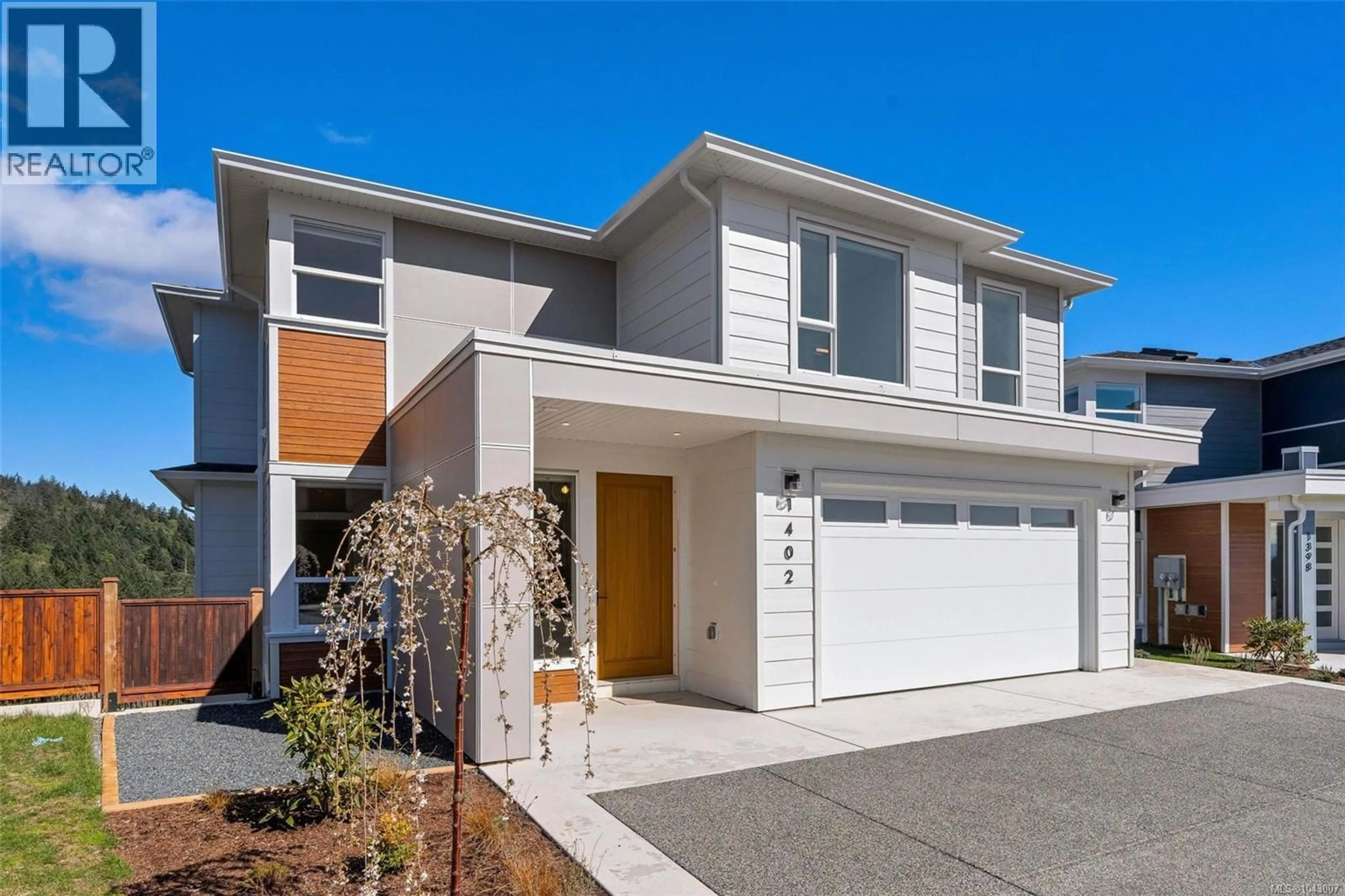 Home with vinyl exterior material, street for 1402 SANDSTONE LANE, Langford British Columbia V9B7A2