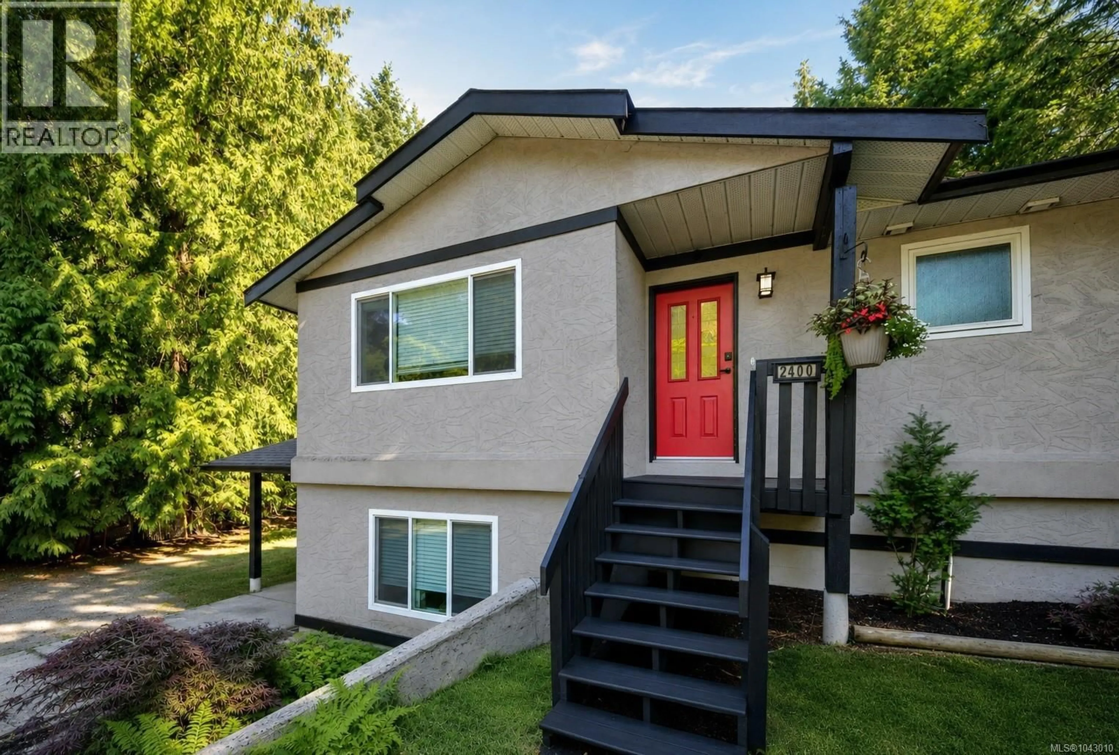 Home with vinyl exterior material, street for 2400 RAVENHILL ROAD, Shawnigan Lake British Columbia V0R2W0