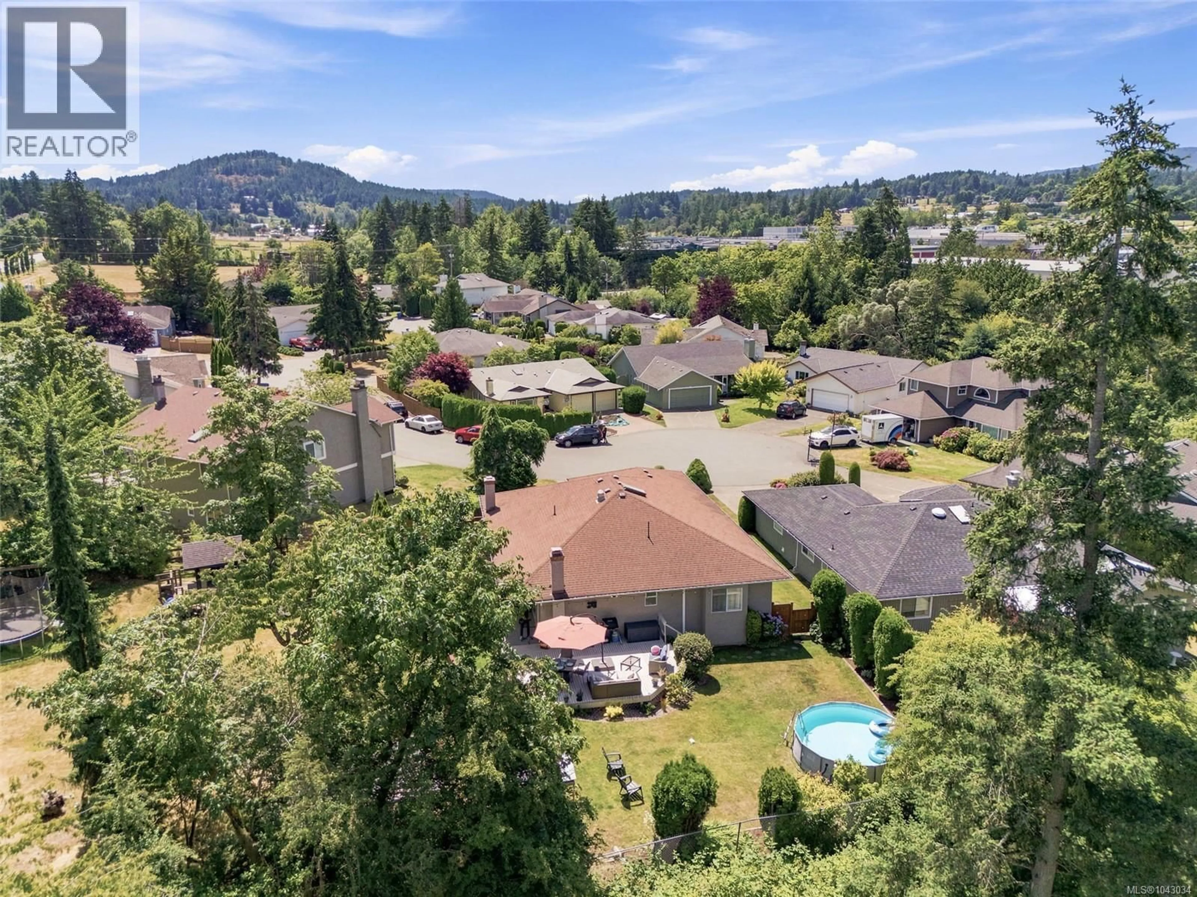 A pic from outside/outdoor area/front of a property/back of a property/a pic from drone, mountain view for 8 - 6766 CENTRAL SAANICH ROAD, Central Saanich British Columbia V8Z7E1