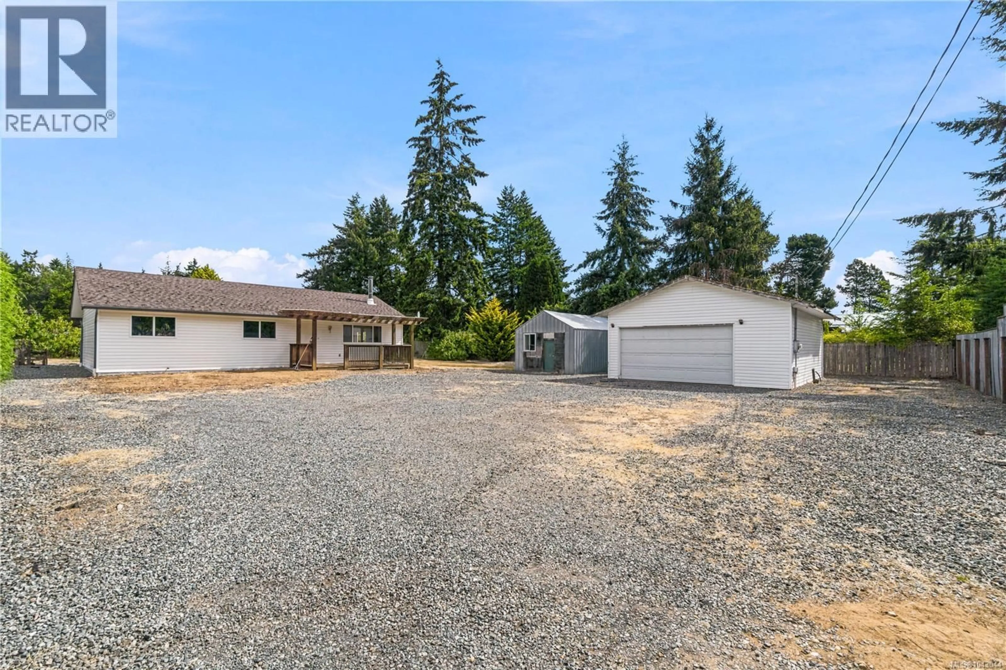 A pic from outside/outdoor area/front of a property/back of a property/a pic from drone, street for 2955 THISTLEDOWN ROAD, Qualicum Beach British Columbia V9K2A2