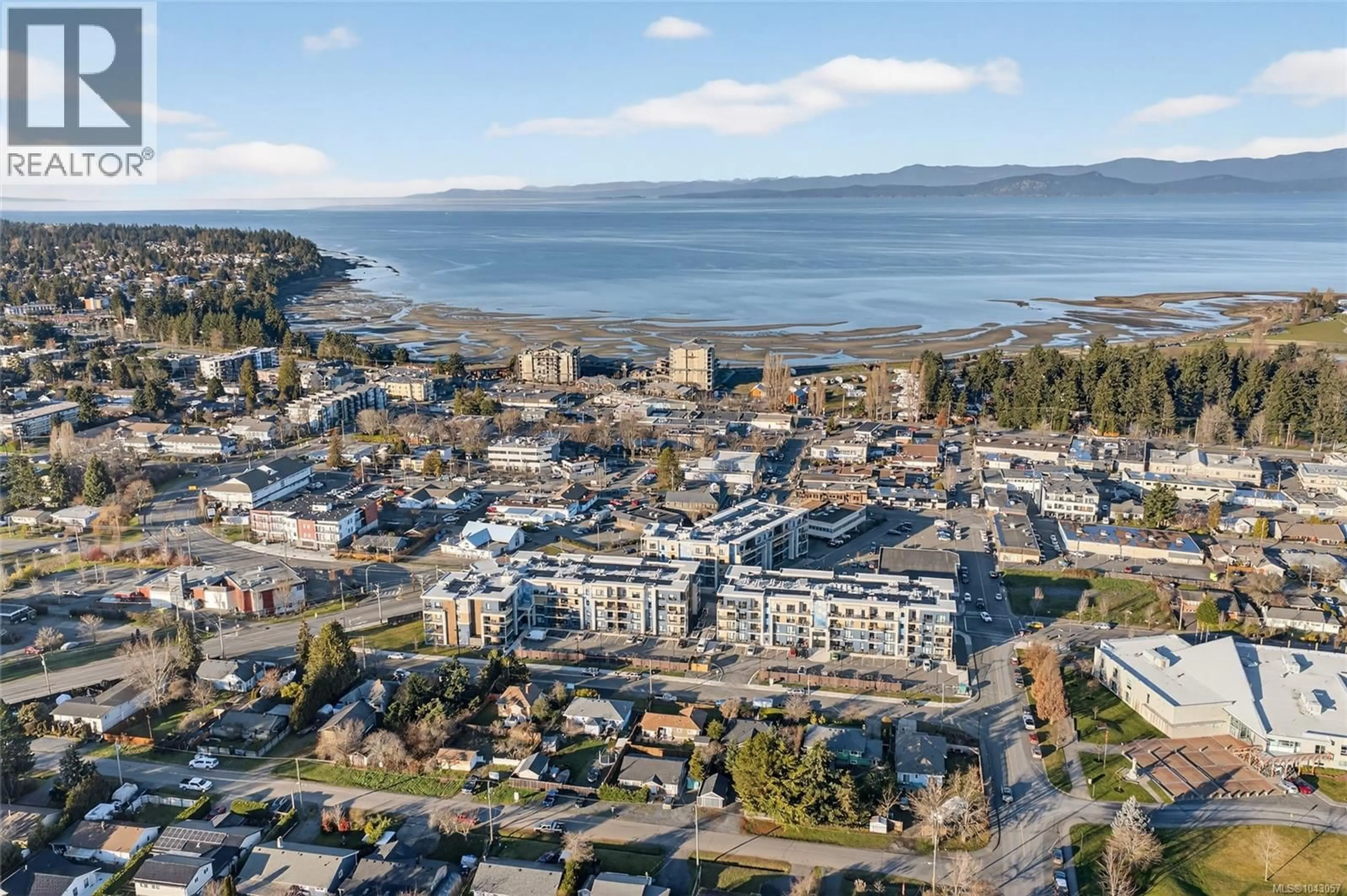 A pic from outside/outdoor area/front of a property/back of a property/a pic from drone, street for 205 - 140 JENSEN AVENUE WEST, Parksville British Columbia V9P0H7