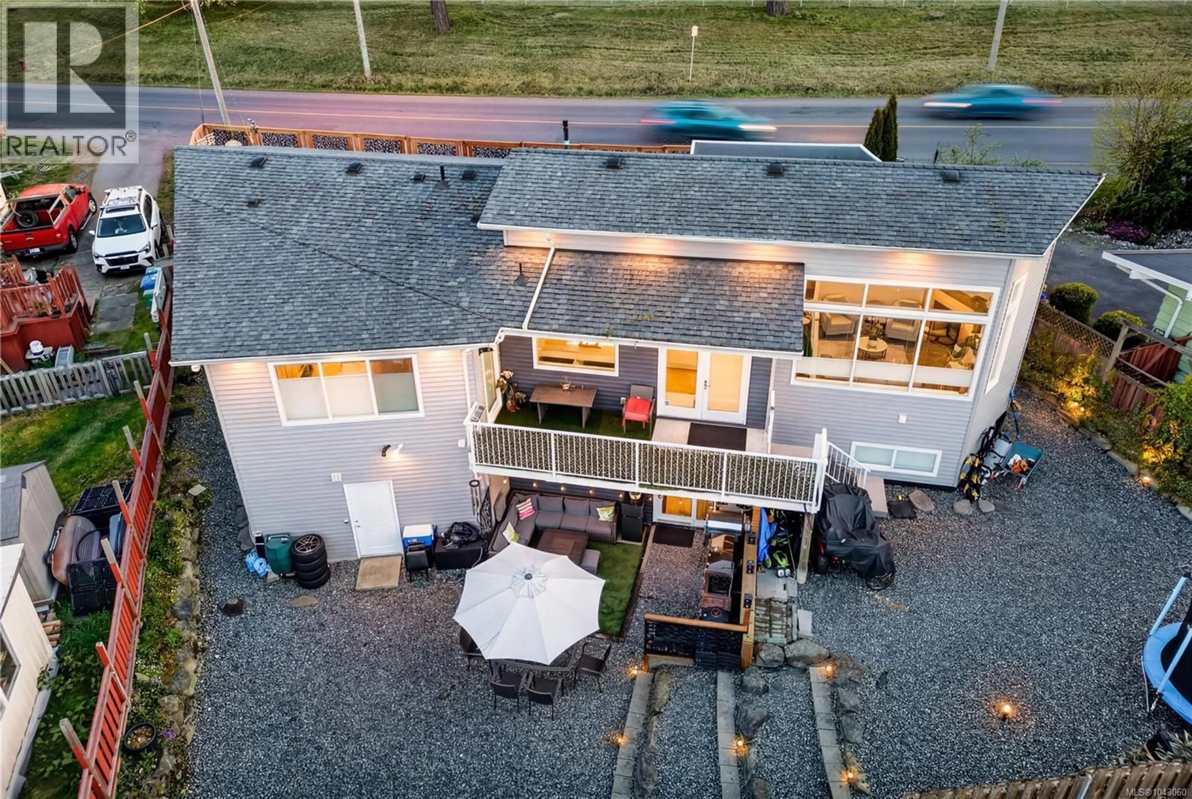 A pic from outside/outdoor area/front of a property/back of a property/a pic from drone, street for 1950 ESTEVAN ROAD, Nanaimo British Columbia V9S3Z2