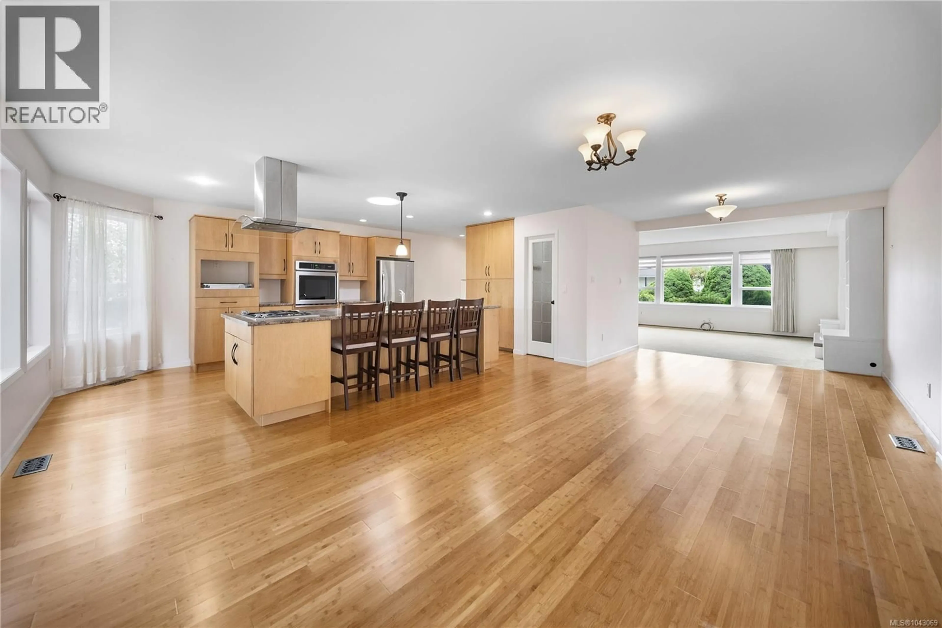 Open concept kitchen, wood/laminate floor for 2619 COSGROVE CRESCENT, Nanaimo British Columbia V9S3P5