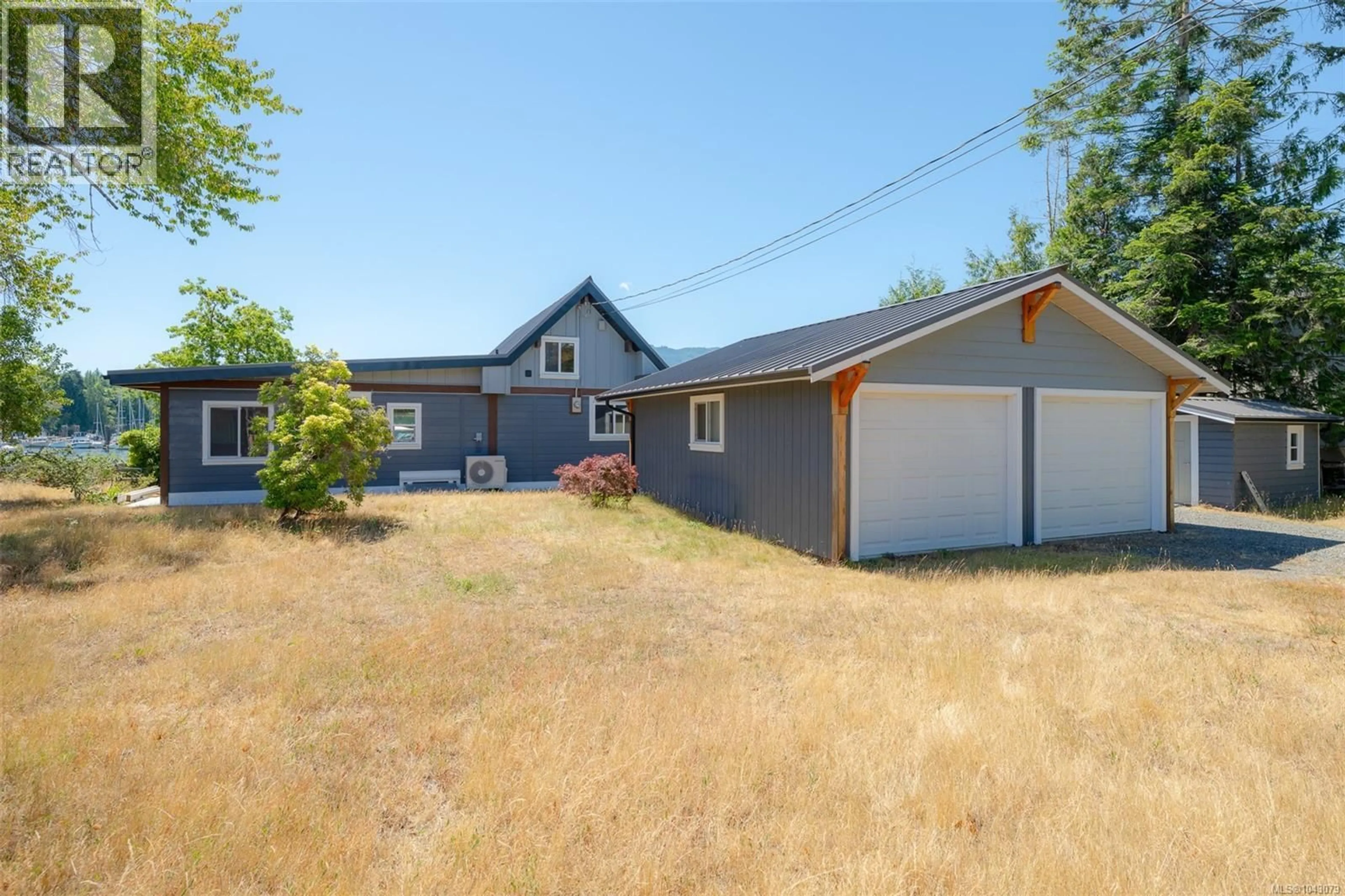 A pic from outside/outdoor area/front of a property/back of a property/a pic from drone, street for 5492 DEEP BAY DRIVE, Bowser British Columbia V0R1G0