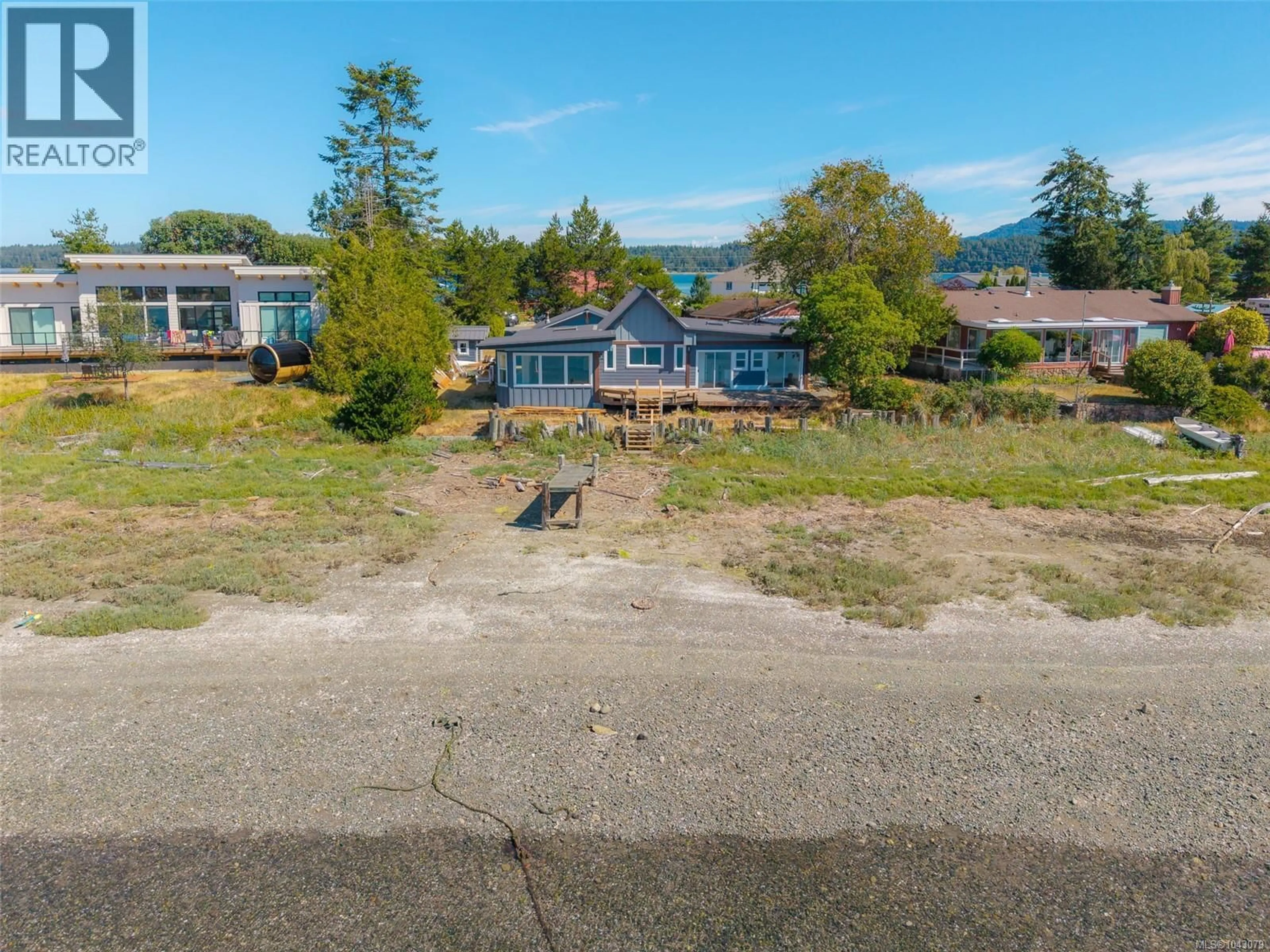 A pic from outside/outdoor area/front of a property/back of a property/a pic from drone, water/lake/river/ocean view for 5492 DEEP BAY DRIVE, Bowser British Columbia V0R1G0