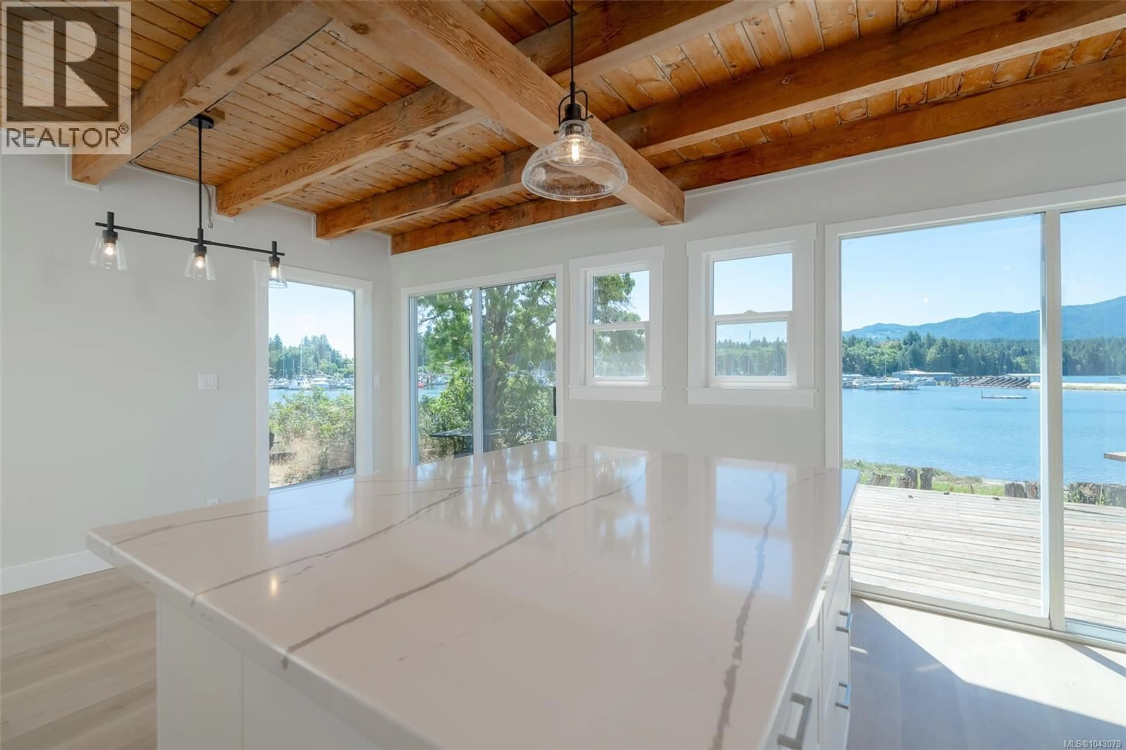 Open concept kitchen, unknown for 5492 DEEP BAY DRIVE, Bowser British Columbia V0R1G0