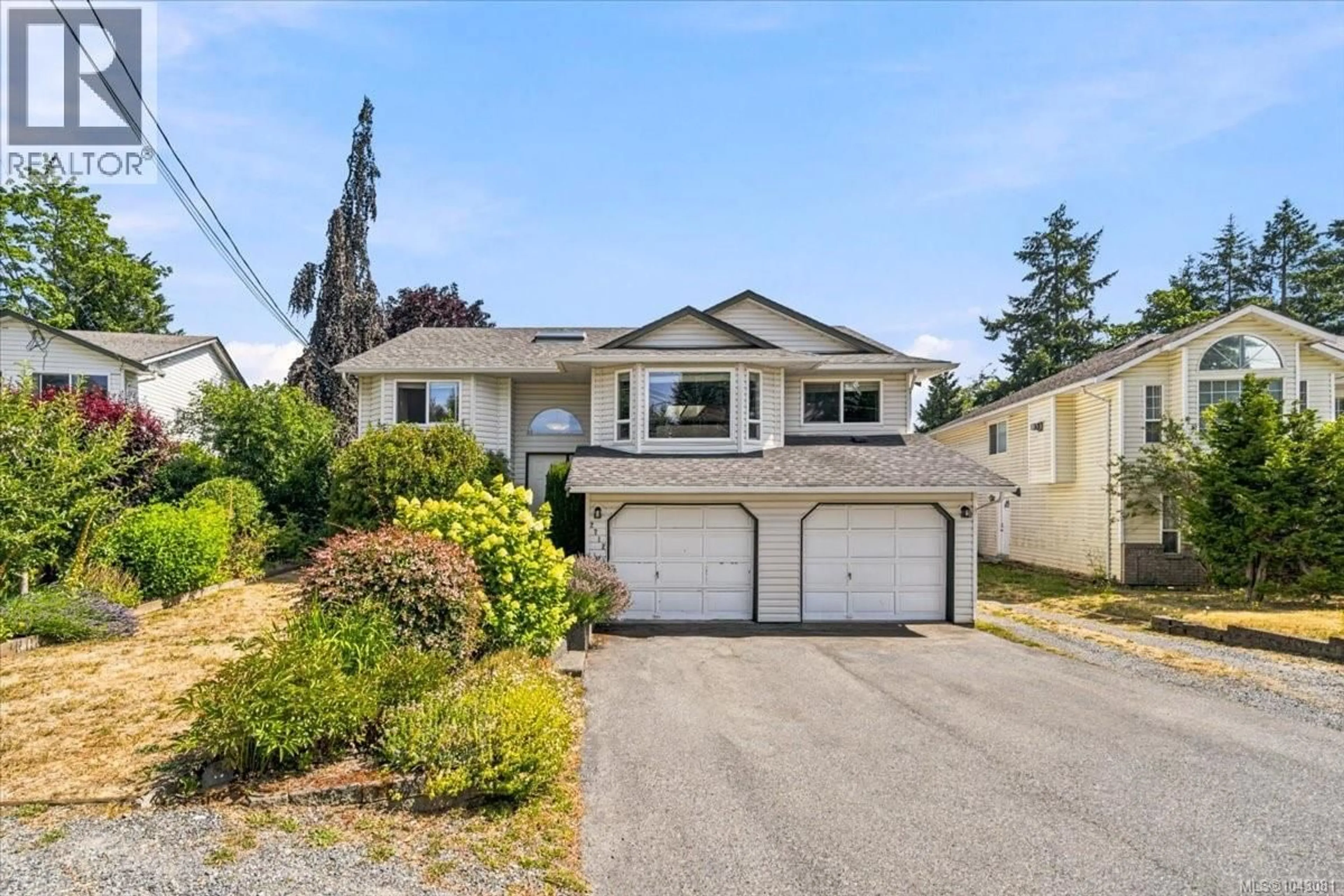Home with vinyl exterior material, street for 2712 LABIEUX ROAD, Nanaimo British Columbia V9T3N6