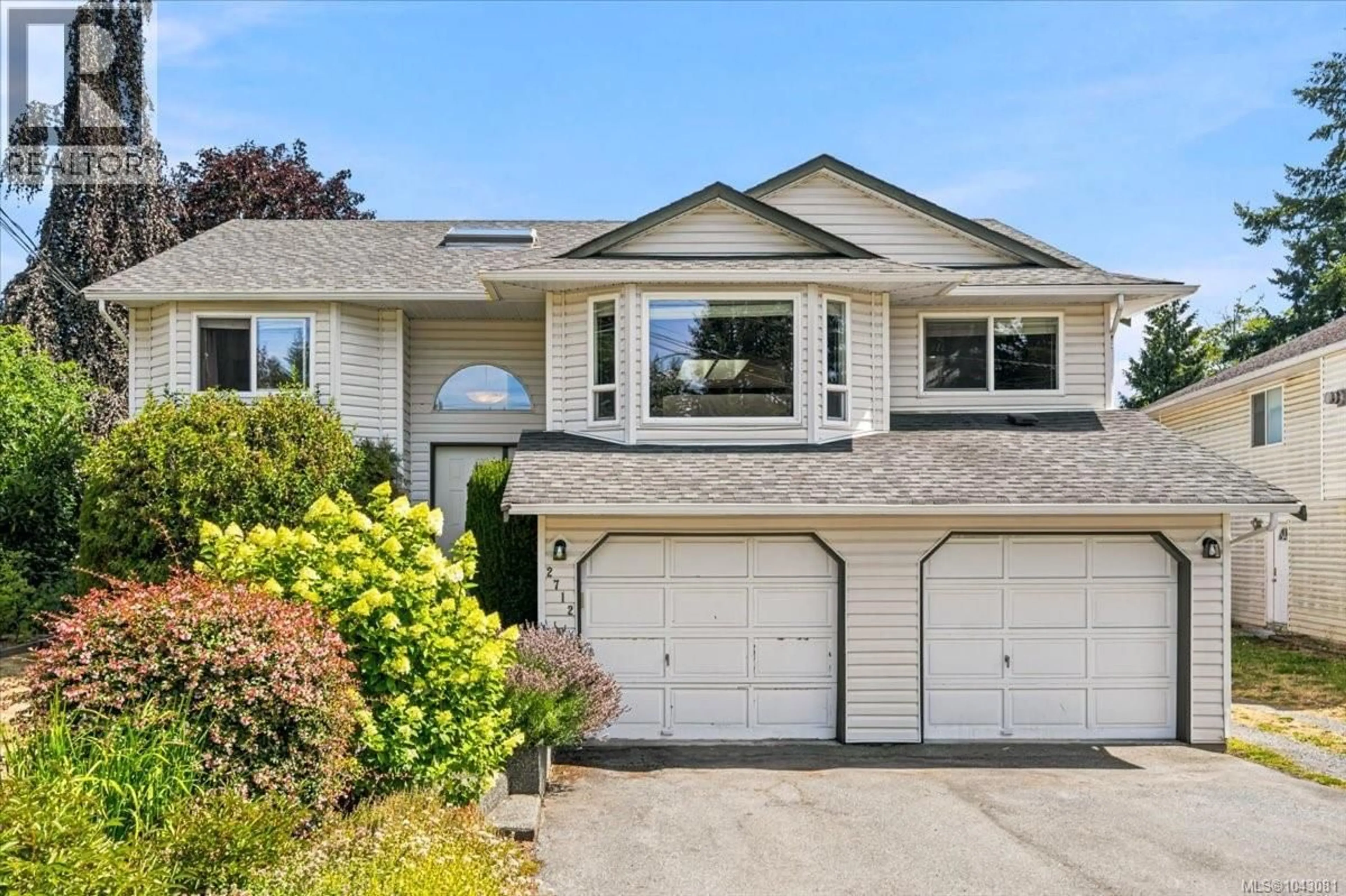 Home with vinyl exterior material, street for 2712 LABIEUX ROAD, Nanaimo British Columbia V9T3N6