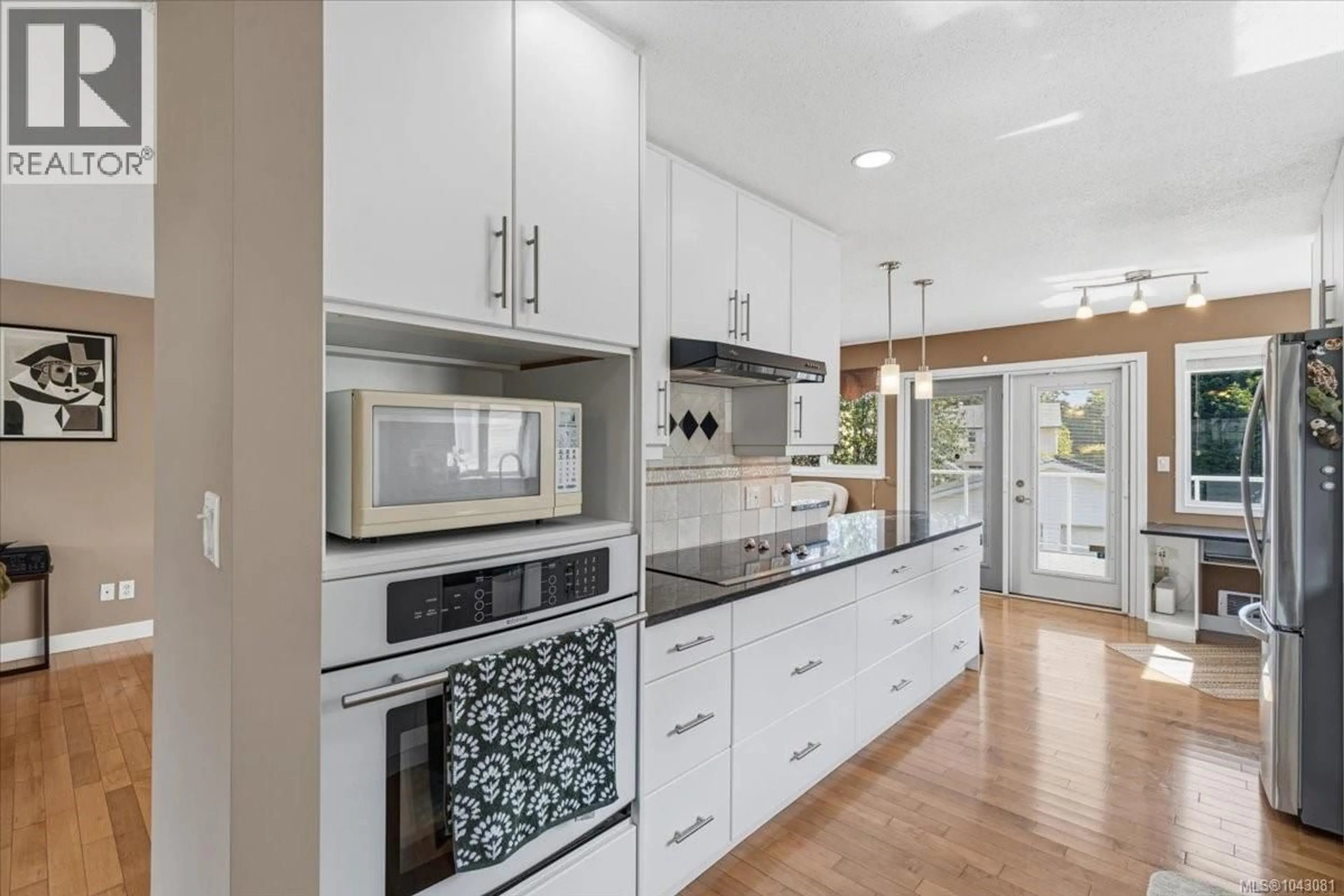 Contemporary kitchen, ceramic/tile floor for 2712 LABIEUX ROAD, Nanaimo British Columbia V9T3N6
