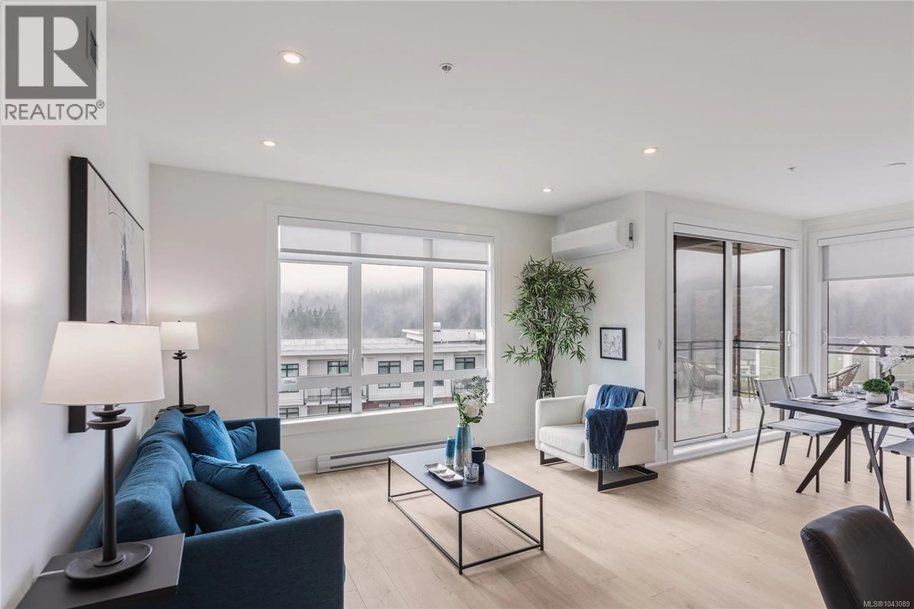 Living room with furniture, wood/laminate floor for 302 - 1114 SAMAR CRESCENT, Langford British Columbia V9B7C5