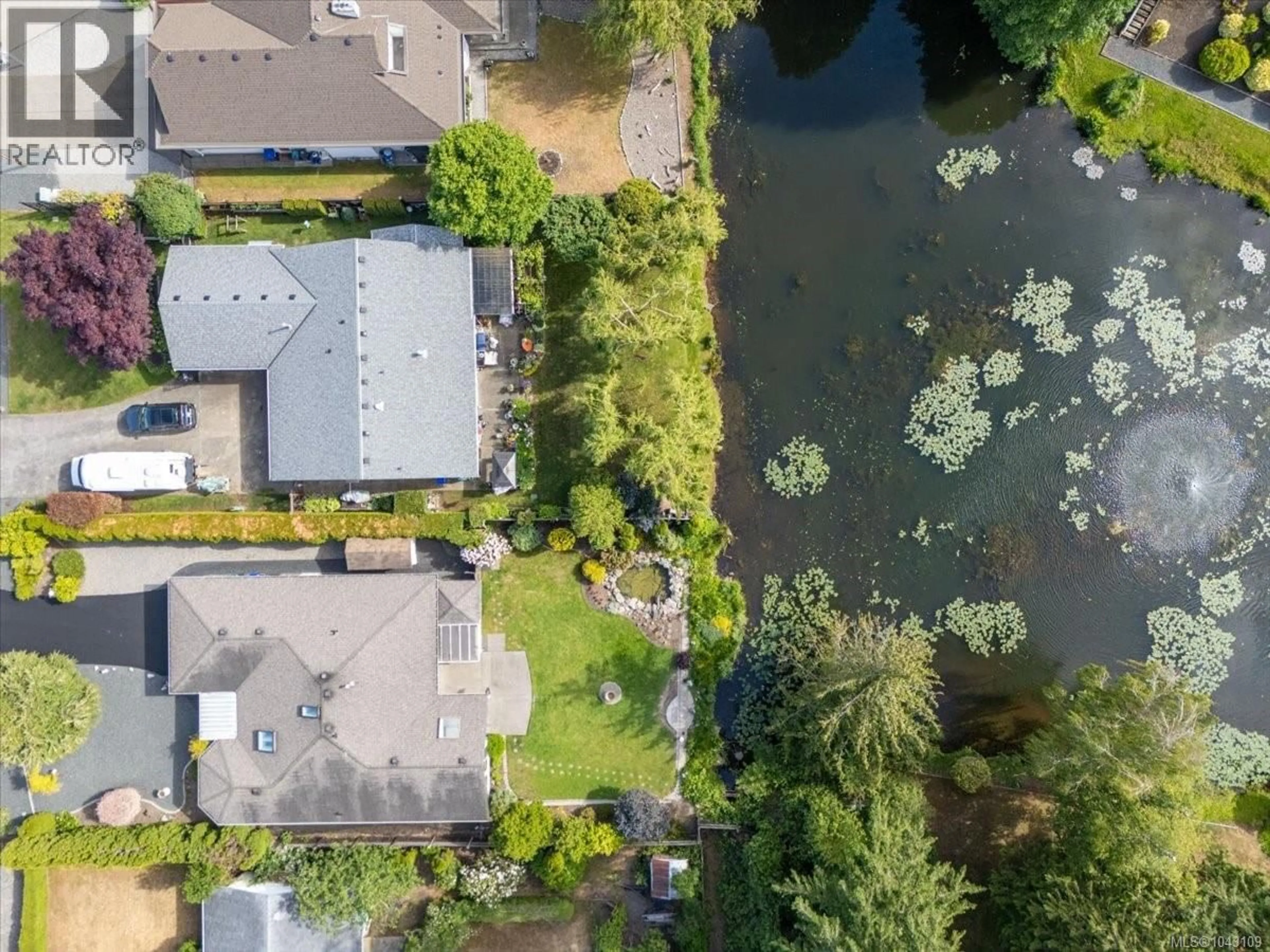 A pic from outside/outdoor area/front of a property/back of a property/a pic from drone, water/lake/river/ocean view for 518 DALMATIAN DRIVE, Parksville British Columbia V9P1Y4