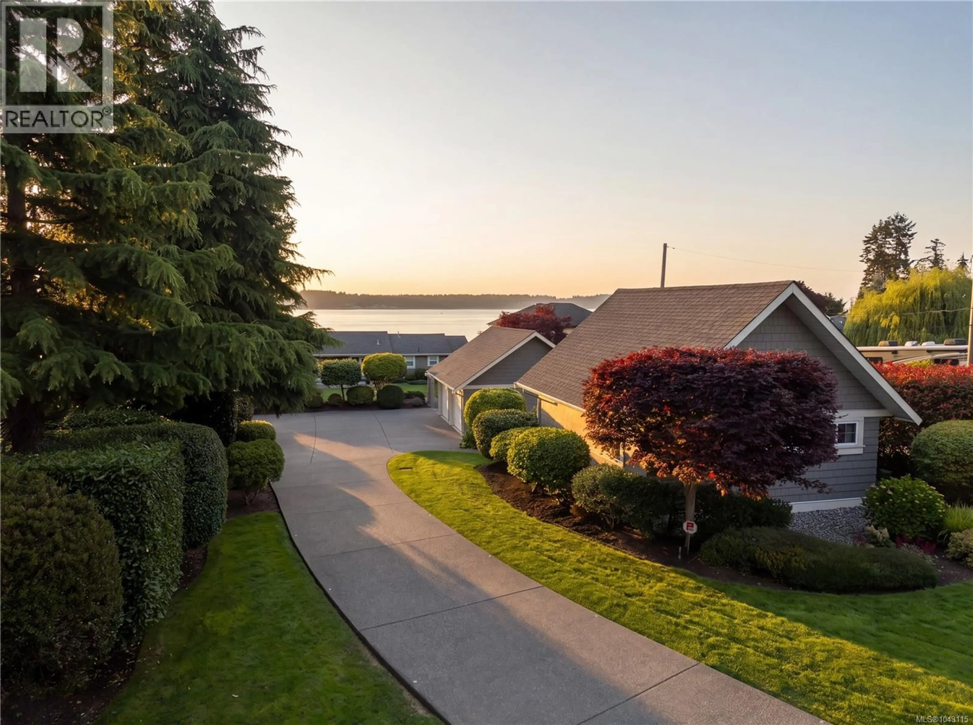 A pic from outside/outdoor area/front of a property/back of a property/a pic from drone, water/lake/river/ocean view for 8585 LOCHSIDE DRIVE, North Saanich British Columbia V8L1M5