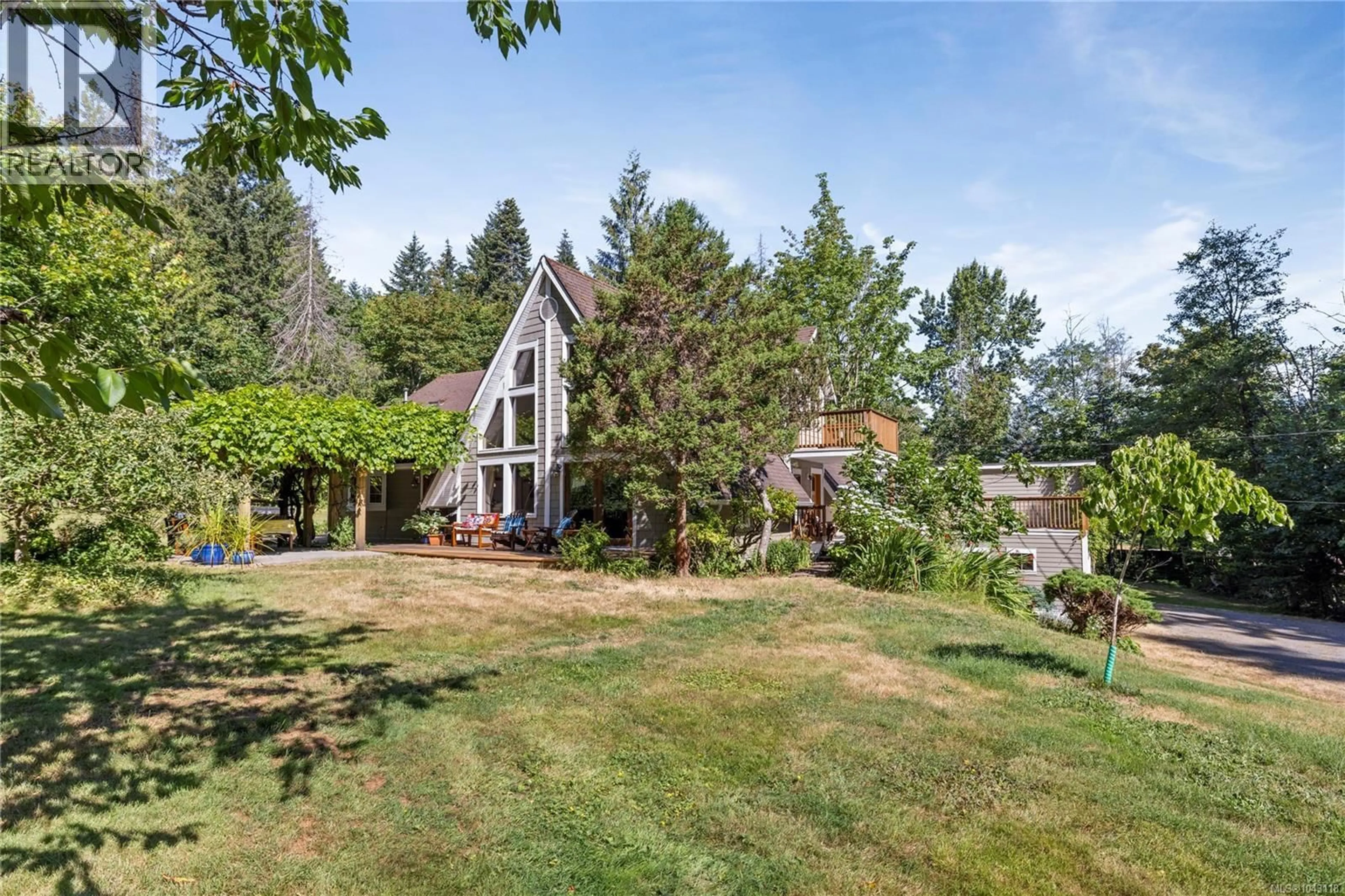 A pic from outside/outdoor area/front of a property/back of a property/a pic from drone, mountain view for 2497 ENEFER ROAD, Nanaimo British Columbia V9X1W4