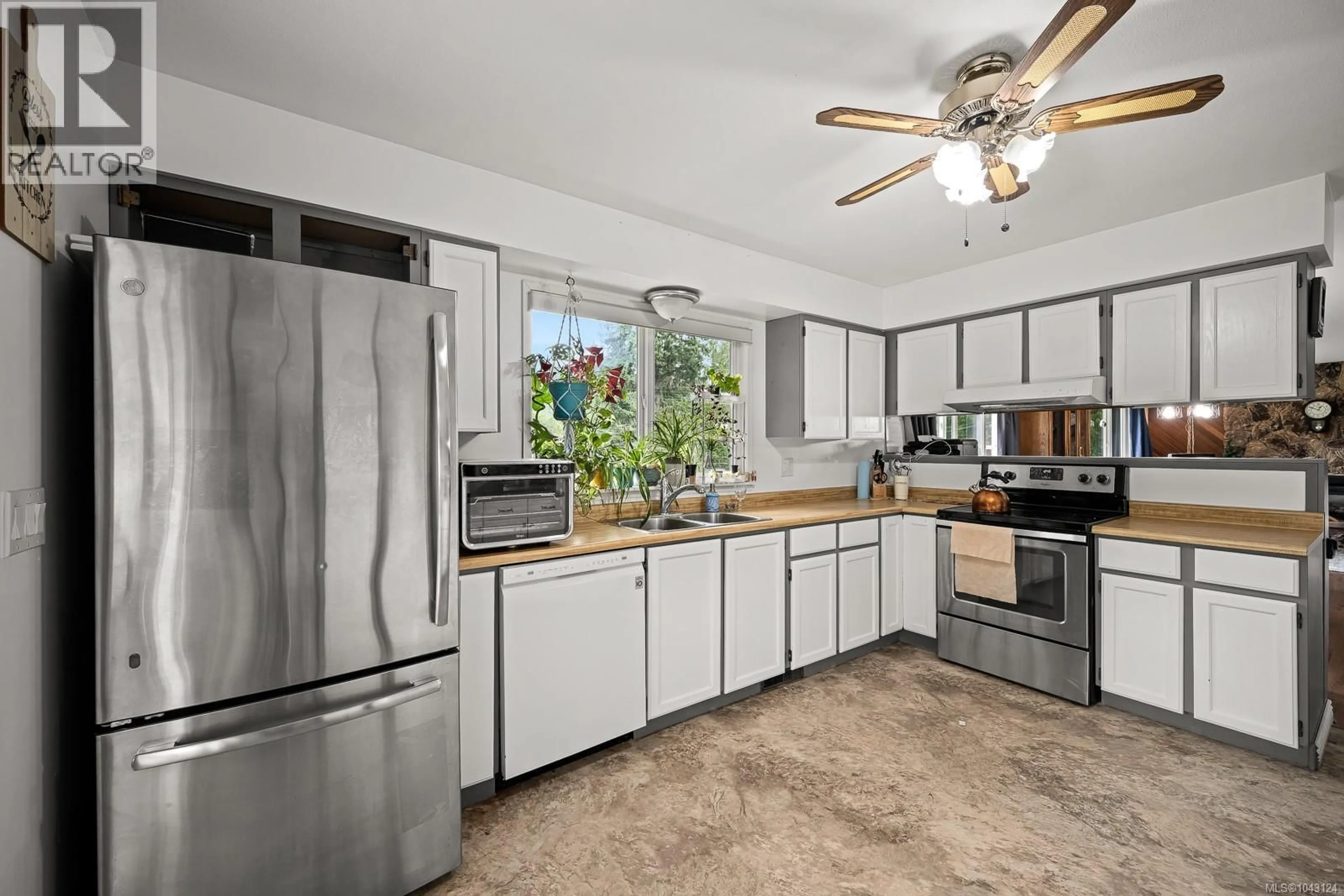 Standard kitchen, ceramic/tile floor for 2560 MABLEY ROAD, Courtenay British Columbia V9N9K2