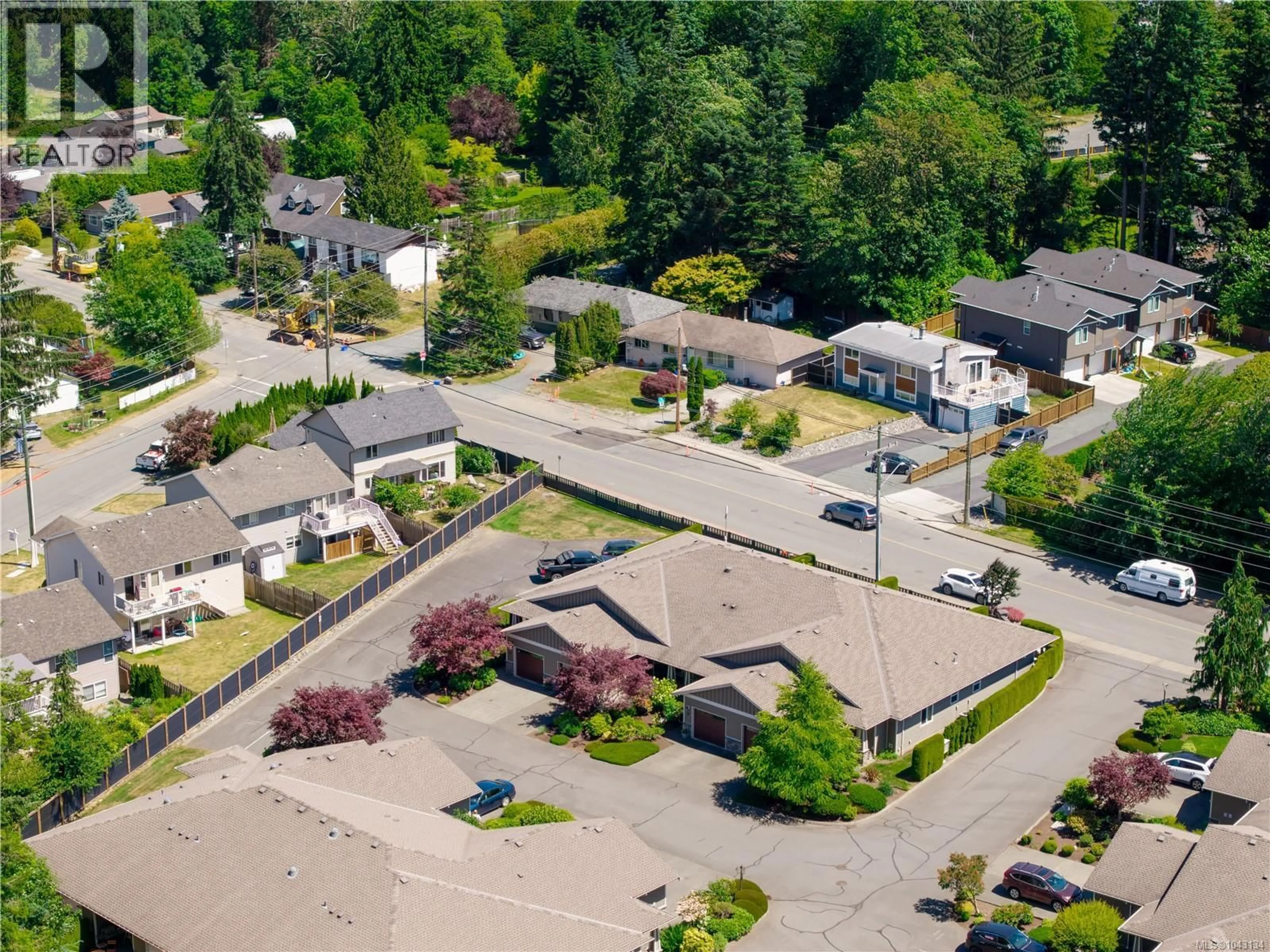 A pic from outside/outdoor area/front of a property/back of a property/a pic from drone, street for 11 - 346 ERICKSON ROAD, Campbell River British Columbia V9W1S7
