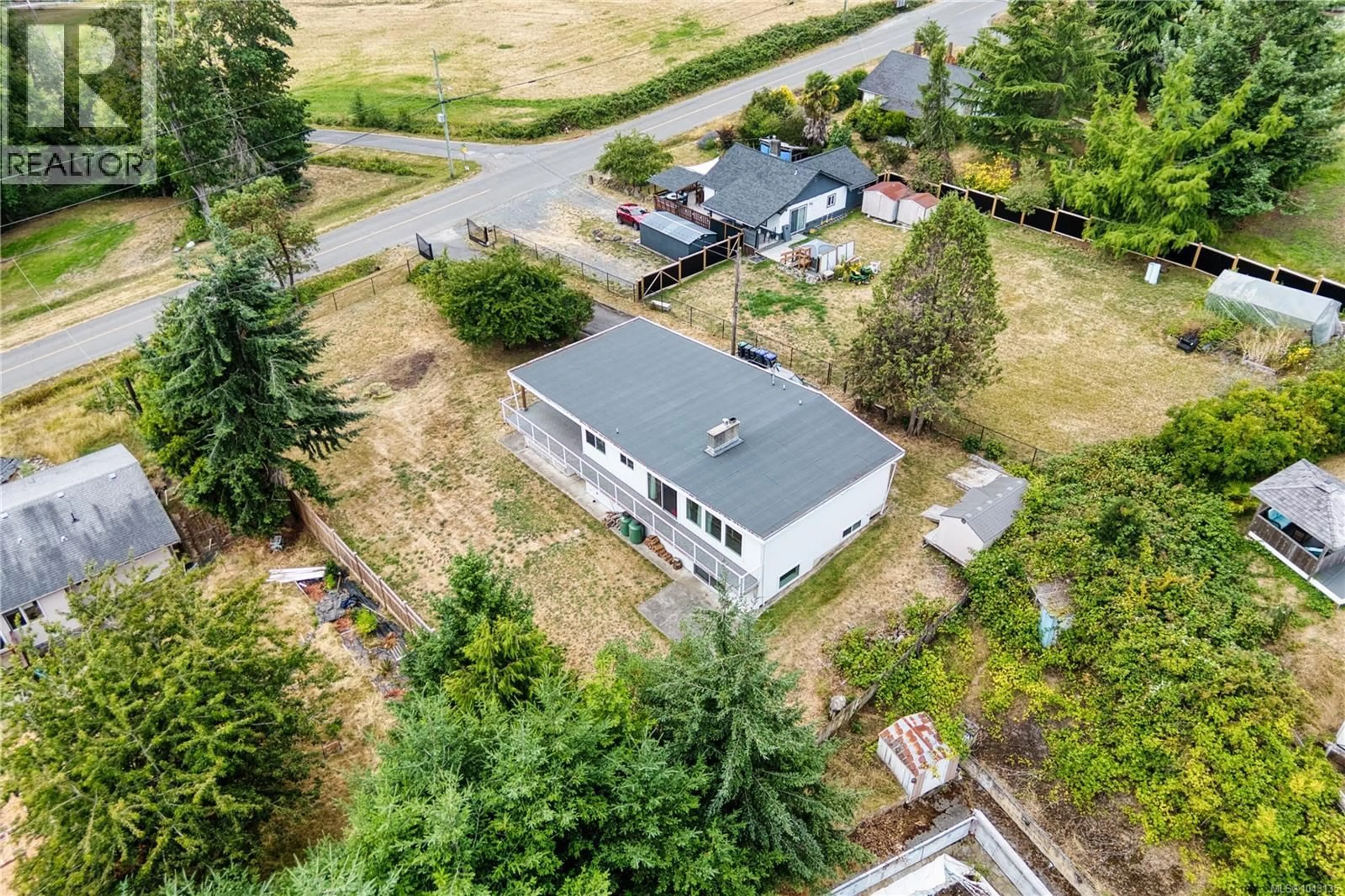 A pic from outside/outdoor area/front of a property/back of a property/a pic from drone, unknown for 3022 BARNES ROAD, Nanaimo British Columbia V9X1P4