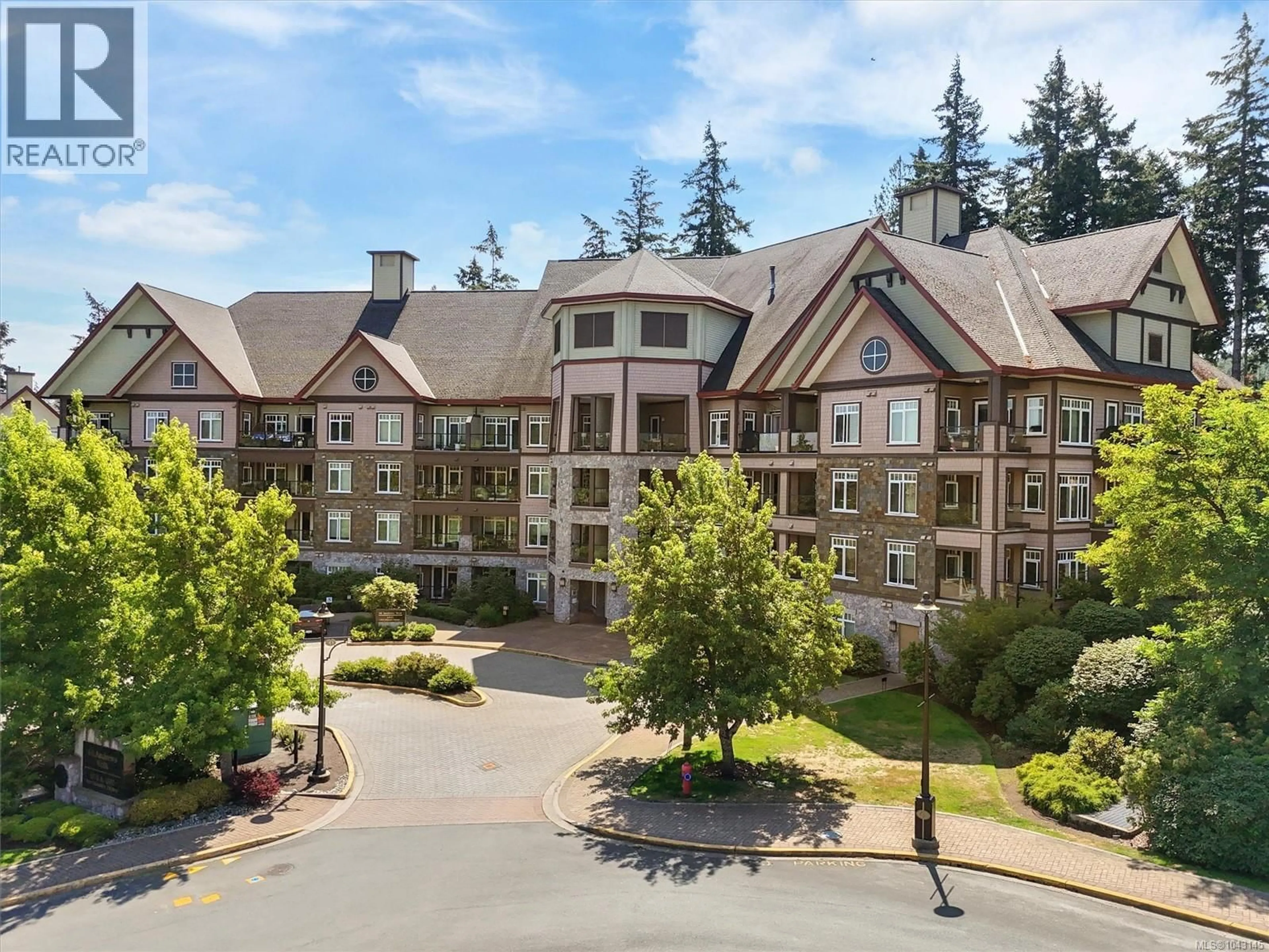 A pic from outside/outdoor area/front of a property/back of a property/a pic from drone, mountain view for 409 - 1395 BEAR MOUNTAIN PARKWAY, Langford British Columbia V9B0E1