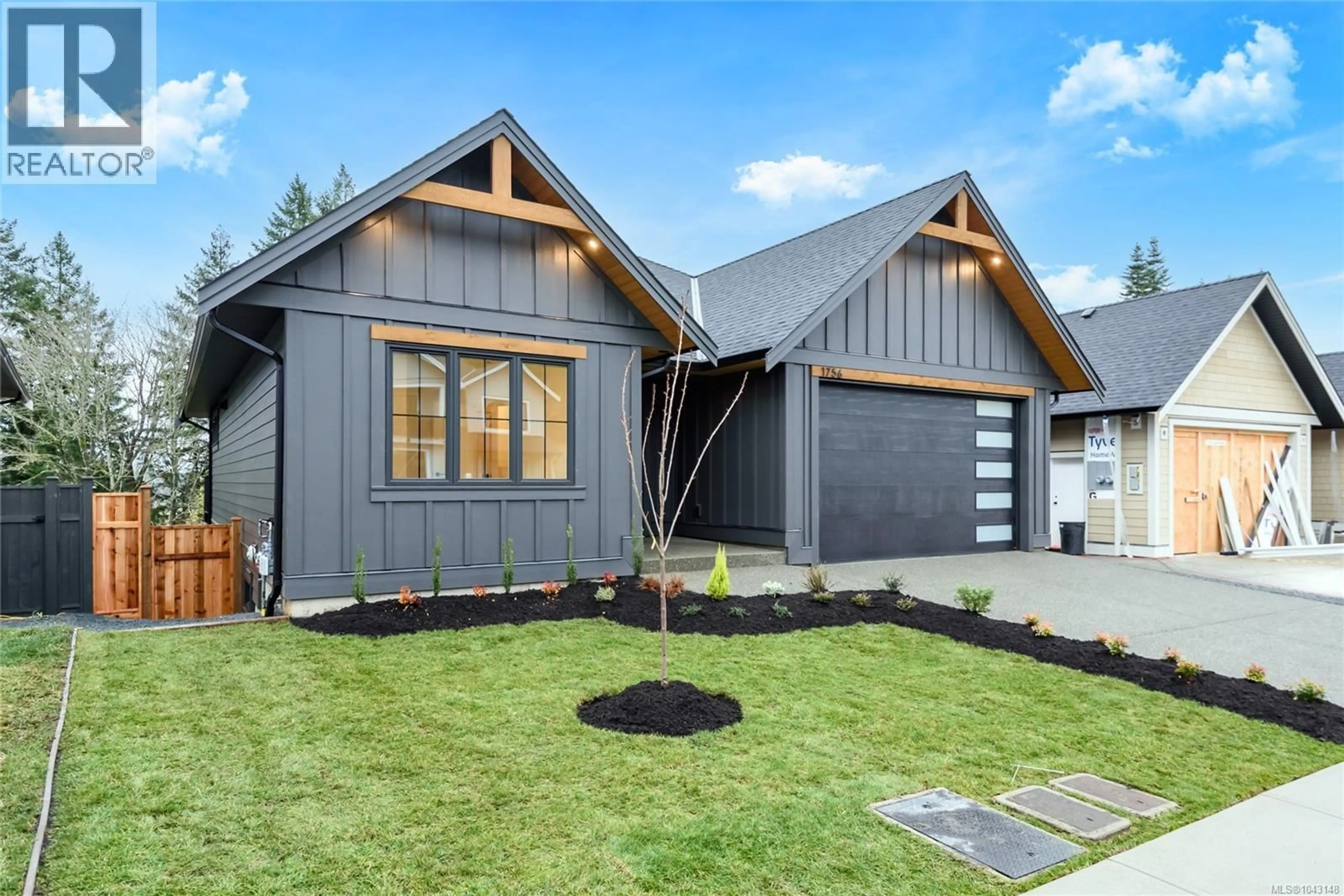 Home with vinyl exterior material, street for 1716 CROWN ISLE BOULEVARD, Courtenay British Columbia V9N0K1